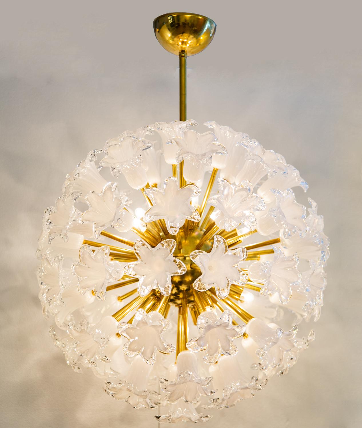 Circular sputnik with Murano glass flowers, in stock
64 opaline and clear blown glass flowers
Natural brass structure
Drop can be adjusted to your specs (quote upon request)
Stem or chain available
12 exposed E12 bulbs
Ready to ship from our