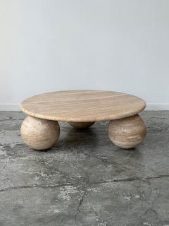 Circular travertine coffee table