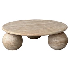 Circular travertine coffee table