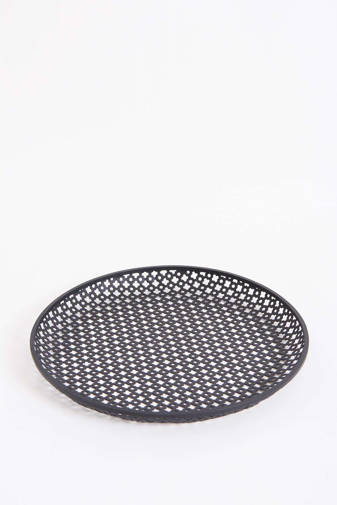 A circular rigitule tray by Mathieu Mategot
France, mid 20th Century
3 cm high by 32 cm diameter