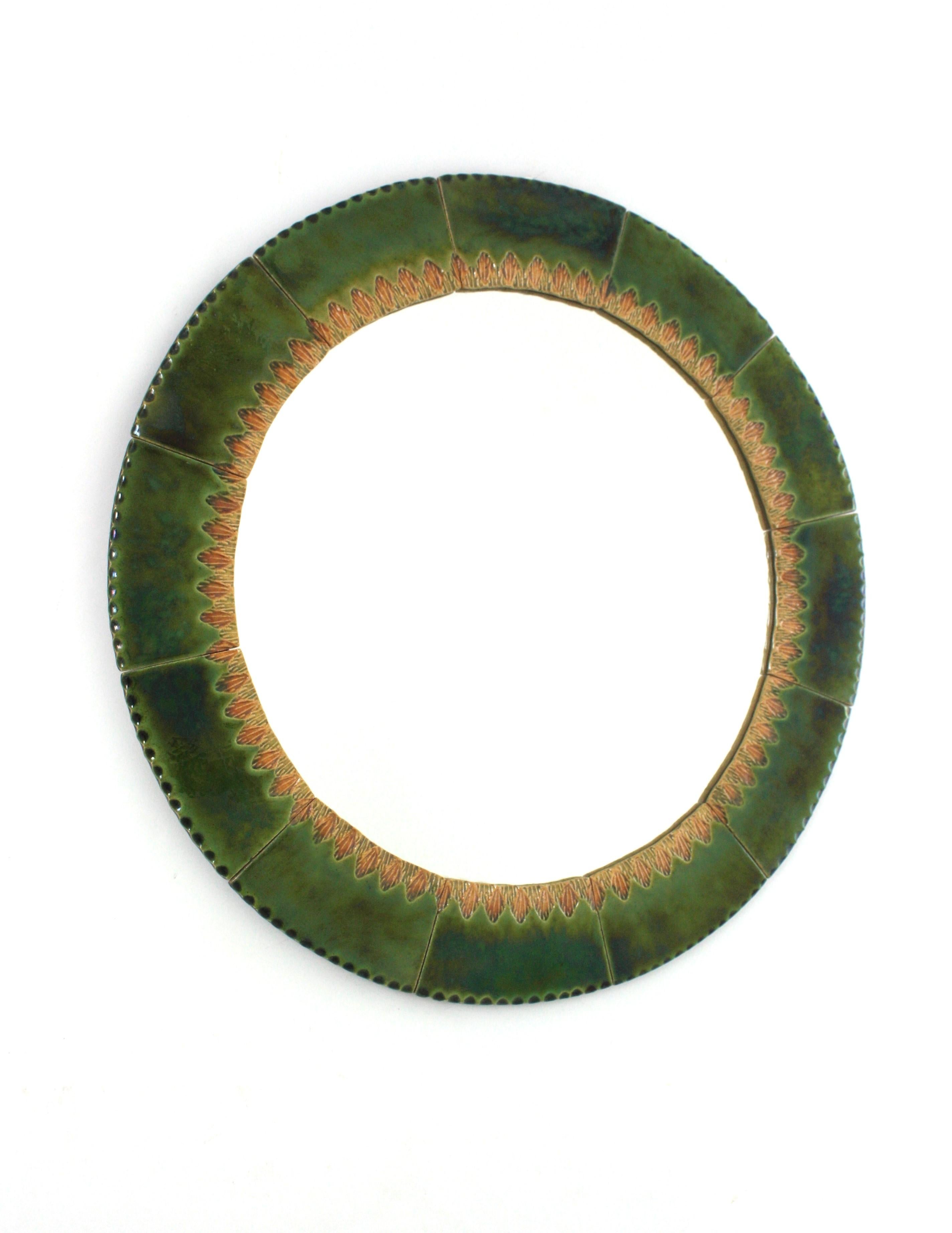 Spanish Ceramic Mirror
Eye-catching ceramic round wall mirror. Maufactured in Spain, 1960s.
Circular shape and large glass mirror surface.
The frame is made of glazed ceramic tiles in shades of green. A decorative pattern in amber and yellow colors
