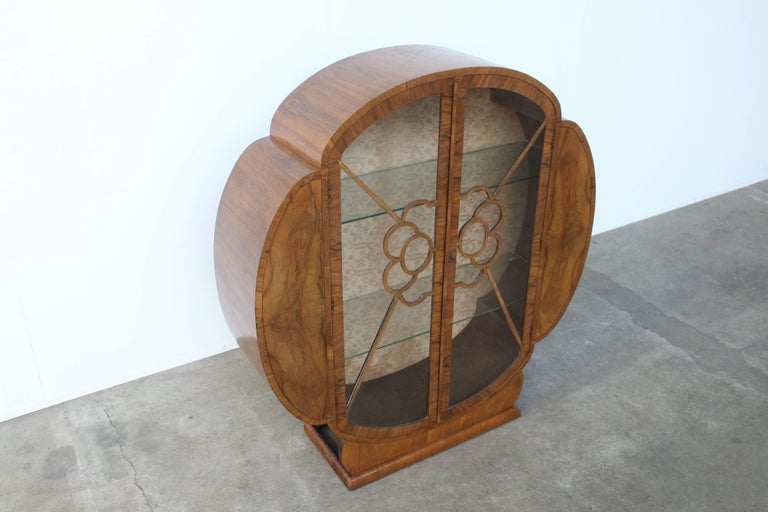 Circular Walnut Art Deco Display with Glass Shelves at 1stDibs