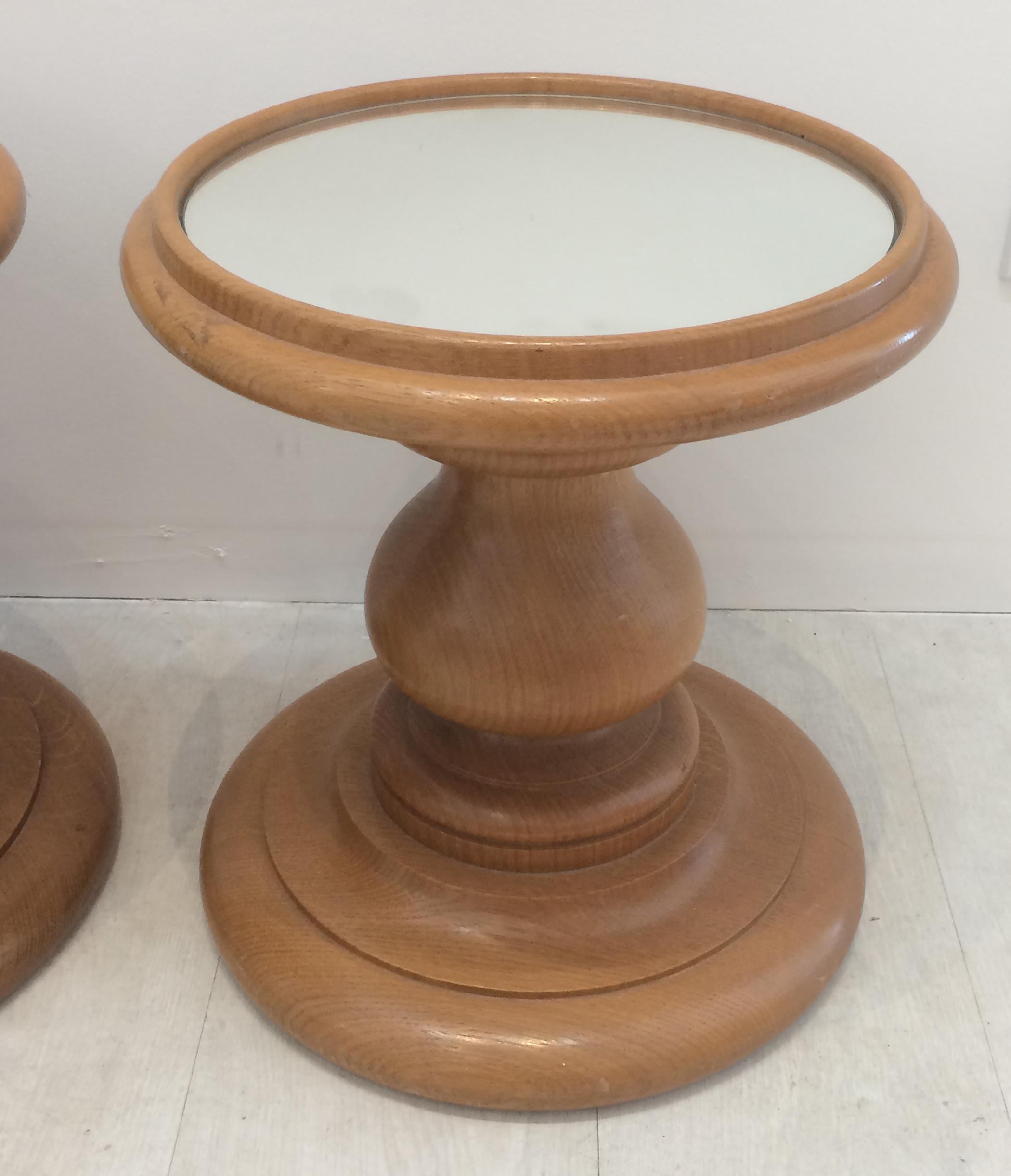 Vintage pair oak circular mirrored top stands in the style of Eames these could have many uses end tables, display pedestals, plant stands. Well proportioned turned oak with some tiger oak showing.