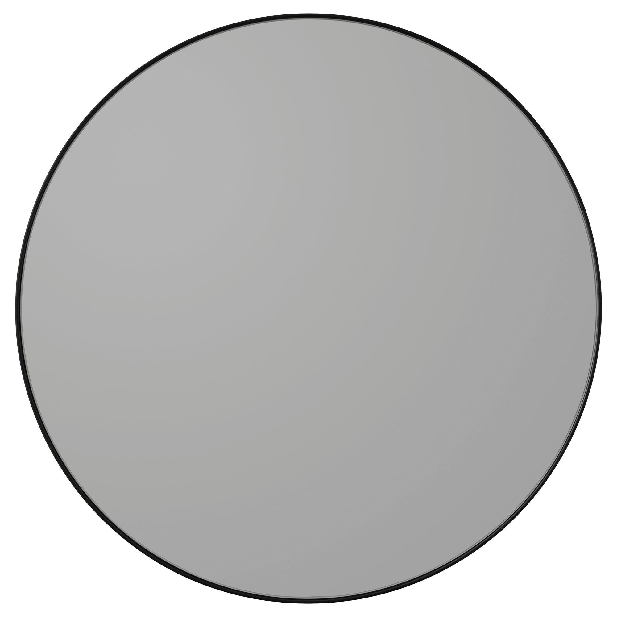 Miroir rond noir Circum
Dimensions : Ø 110 x 2 cm
Matériaux : Verre, cuivre, MDF

Les miroirs Circum sont un ajout élégant à la maison et avec leurs cadres fins et leur verre teinté, Circum est également parfait pour les effets