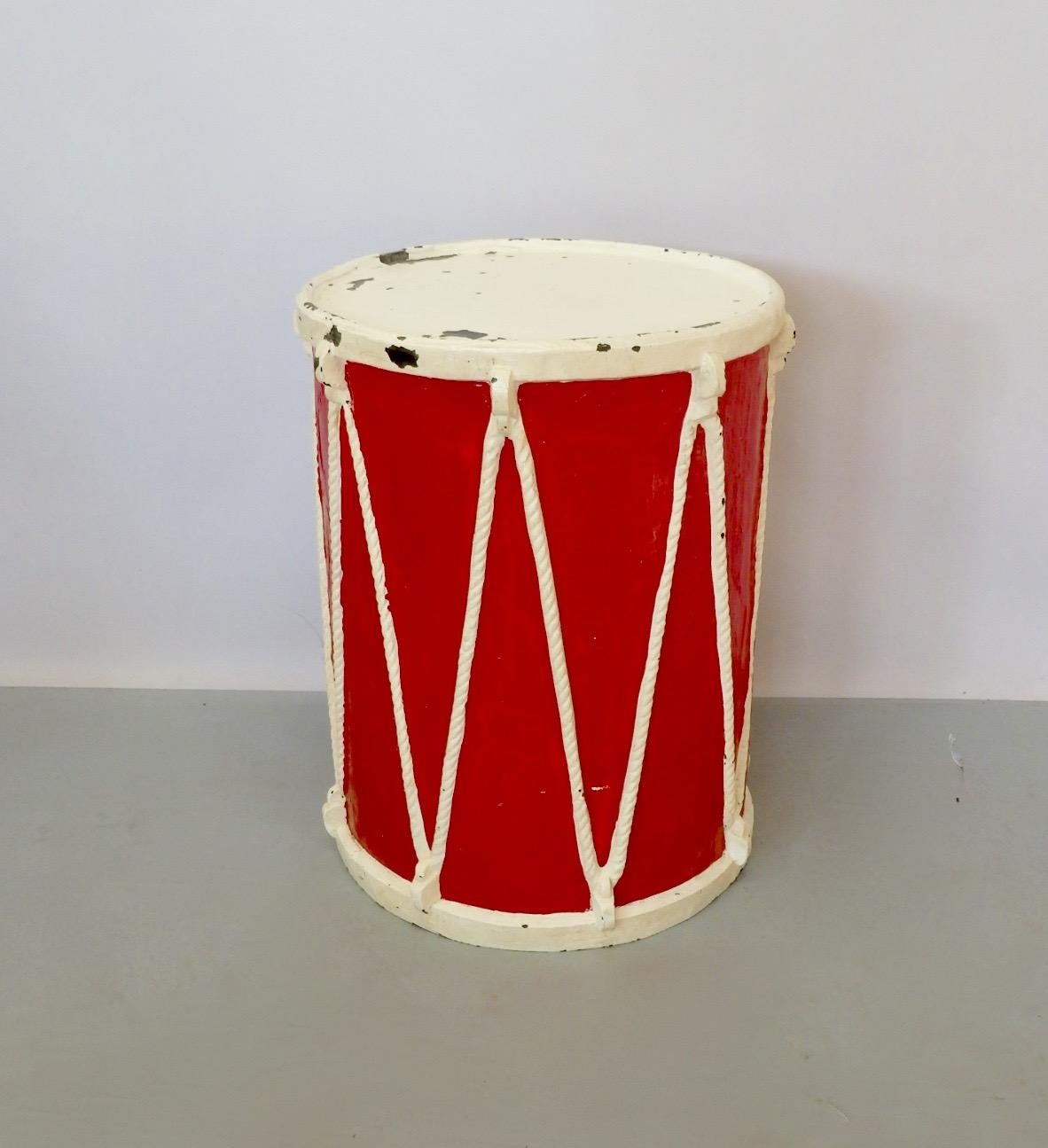 Molded fiberglass drum. Possibly circus prop or display piece.