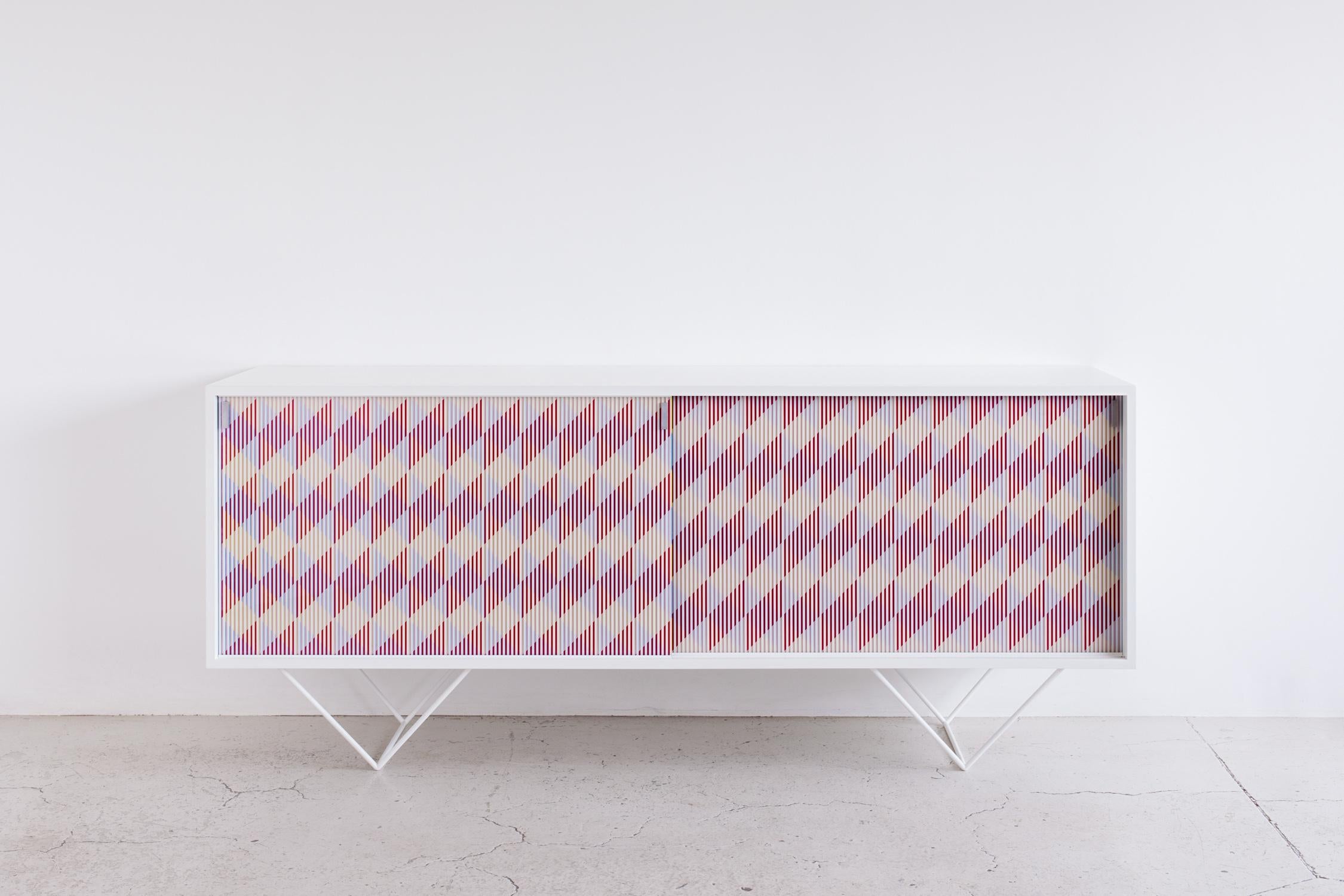 Circus Sideboard by Studio Roso
Dimensions: D177 x W75 x H47 cm
Material: Wood, glass, steel
Weight: 46 kg 

Studio Roso is a partnership between Sophie Nielsen and Rolf Knudsen.
The studio has in the last 10 years produced a number of large