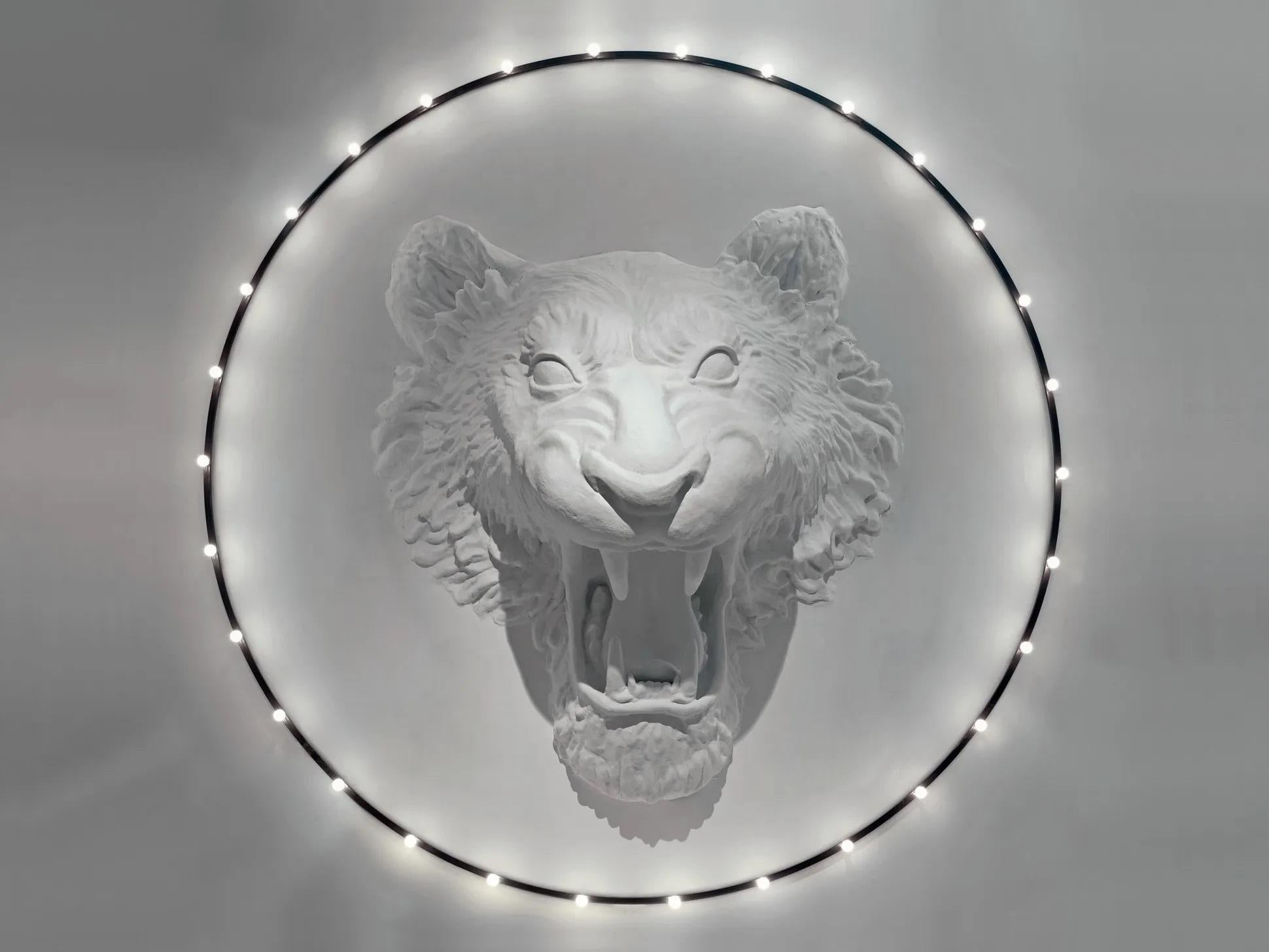 Circus wall lamp by Imperfettolab
2012
Designer : Verter Turroni
Dimensions: D 400 X H 130 cm
Materials: Fibreglass

An installation of great impact and large dimensions. Inspired by an imaginative circus, in which a roaring lion seems to jump