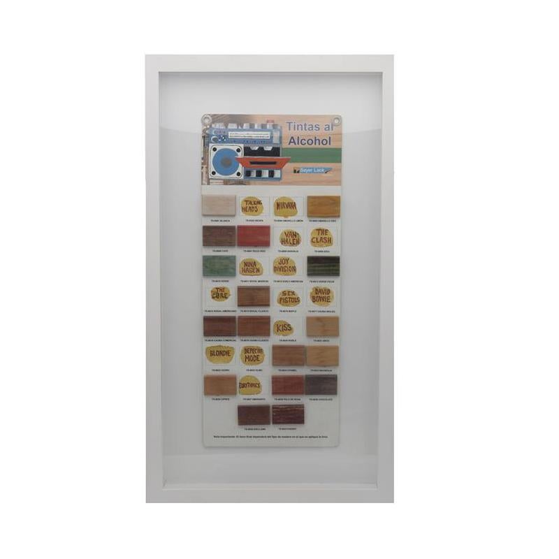 A witty art-object piece by Mexican artist Cisco Jiménez. It's an Sayer Lack wood inks catalogue intervened by the artist with collage and acrylic. The piece resembles a cassette catalogue featuring the names of great rock bands from the 1980s and