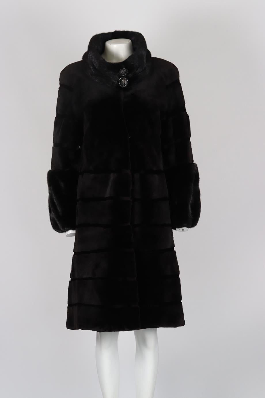 Cisodono Mink Fur Coat. Black. Long Sleeve. Turtleneck. Hook and eye fastening - Front. No composition label. IT 40 (UK 8, US 4, FR 36). Shoulder to shoulder: 19 in. Bust: 40.3 in. Waist: 36.2 in. Hips: 41.1 in. Length: 39.2 in. Condition: Used.