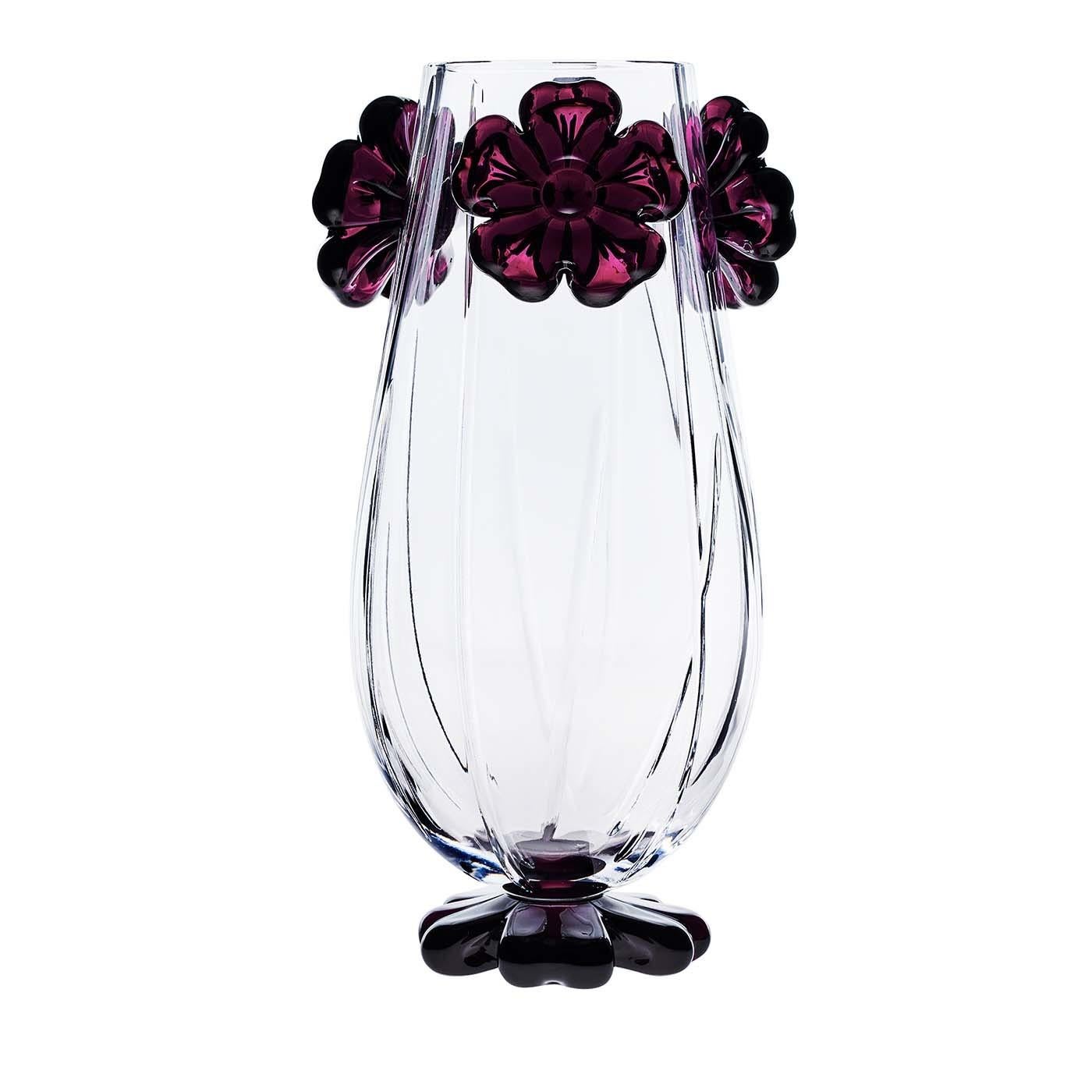 A superb example of exquisite craftsmanship, this vase was entirely handmade and is a work of art that can be displayed anywhere in a classic or modern home. It comprises a delicately curved body of transparent crystal with a base and four top