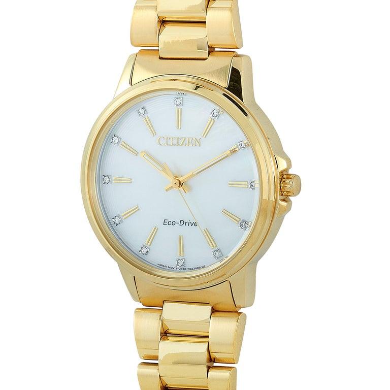 This is the Citizen Chandler Eco-Drive watch, reference number FE7032-51D. It is presented with a gold-tone stainless steel case that measures 37 mm in diameter. The case is water-resistant to 50 meters and mounted onto a matching gold-tone