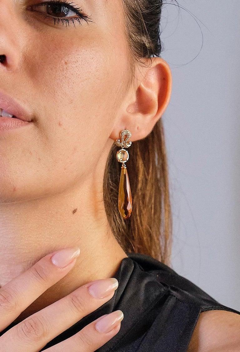 Rossella Ugolini Deco Collection 18 Karats Yellow Gold 0.20 Karat White Diamonds and Citrine Drops broilet cut Dangle Earrings. A bright jewel that can match every skin tone, enchanting the complexion and radiance of the skin. Citrine Drops with the