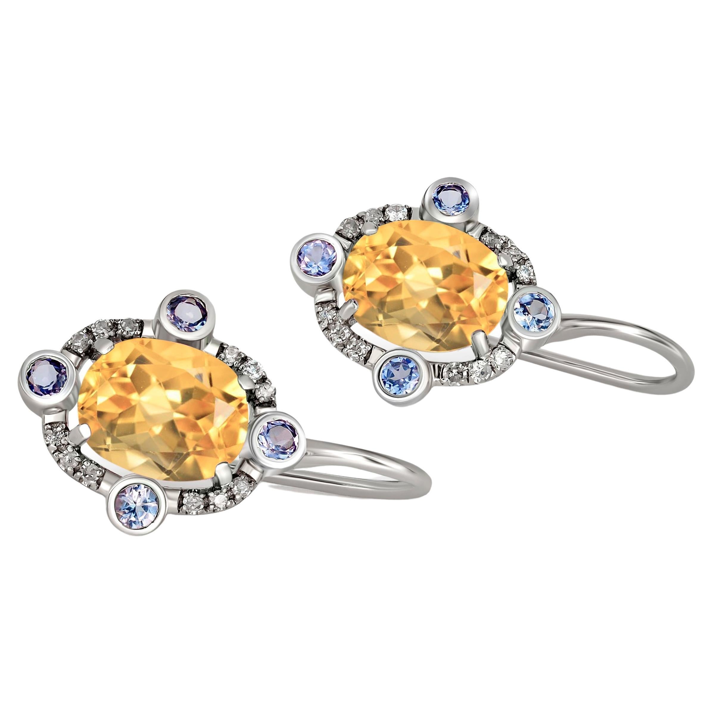 Boucles d'oreilles pendantes en or 14k avec citrine.