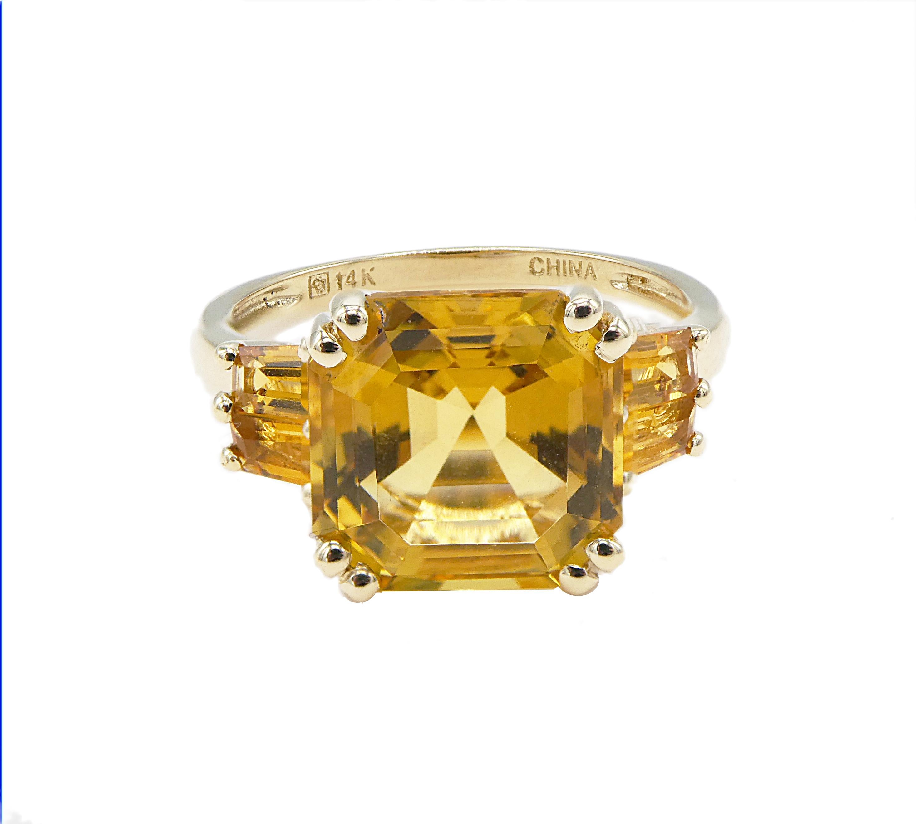 Citrine 14K Yellow Gold Cocktail Ring Size 7.25

Metal: 14k yellow gold
Weight: 3.42 grams
Citrine: Approx. 10mm x 10mm x 6.3mm approx. 4.00 carats
Side Stones: 4 Tapered Baguette Citrine stones on the shoulders
Size: 7.25 (US)
Markings: Stamped