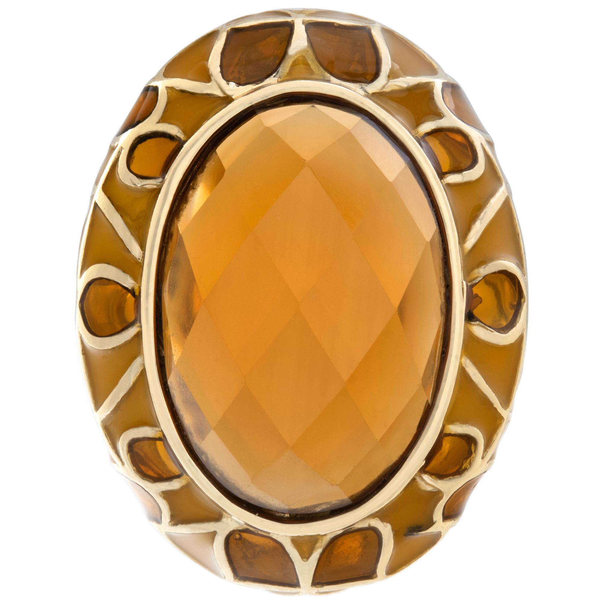 Brilliant diamond cut oval shape citrine (approx. 16.00 carats) set in 14K yellow gold. Beautiful 