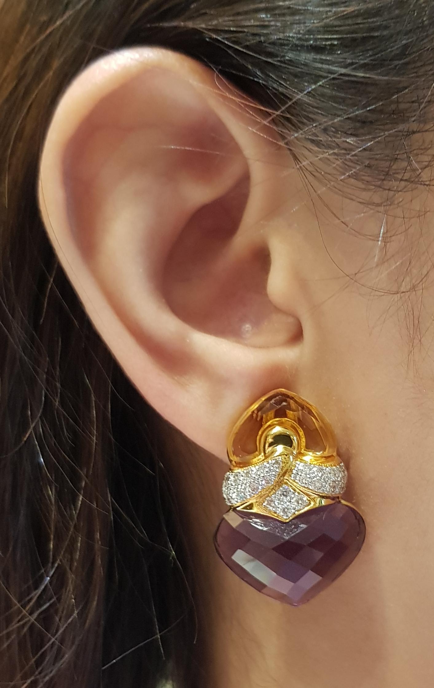 Citrine 7.13 carats, Amethyst 27.34 carats with Diamond 1.01 carat Earrings set in 18 Karat Gold Settings

Width:  2.2 cm 
Length:  3.0 cm
Total Weight: 18.83 grams

