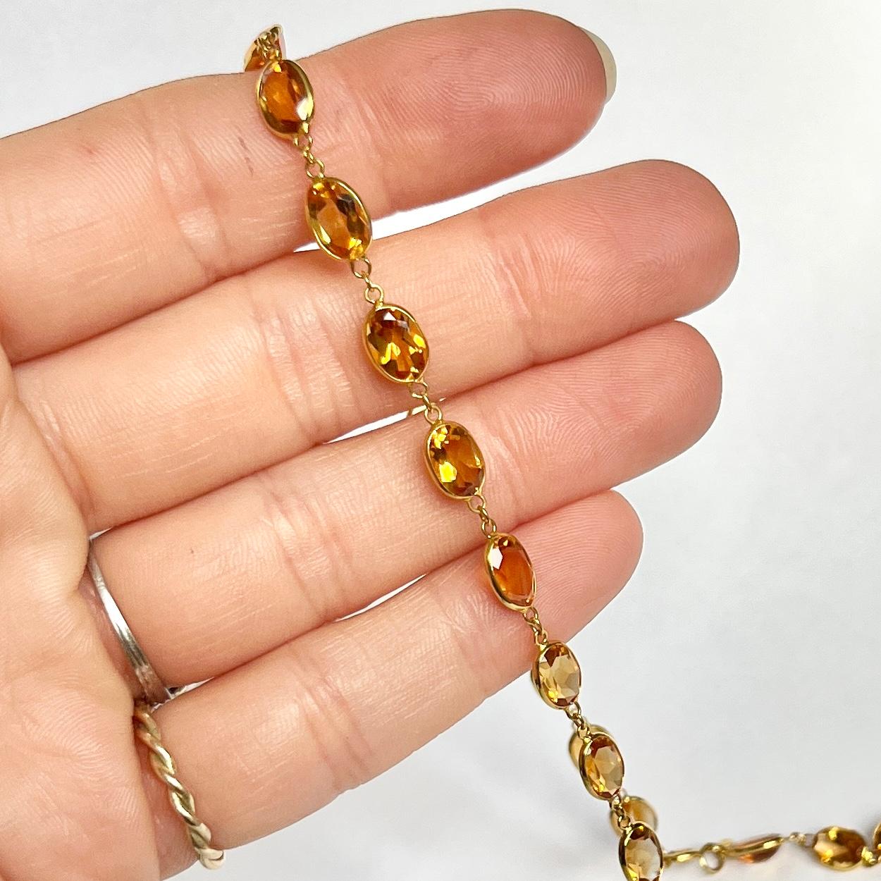 This gorgeous necklace holds 40 stones all set in simple settings. The stones are all the same size. Modelled in 18carat gold.  

Length: 47.5cm
Stone Dimensions: 6.5x5.5mm

Weight: 8.4g 
