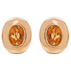 Clous d'oreilles ovales en or jaune 18 carats et citrine