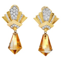 Boucles d
oreilles jour et nuit en citrine et diamant