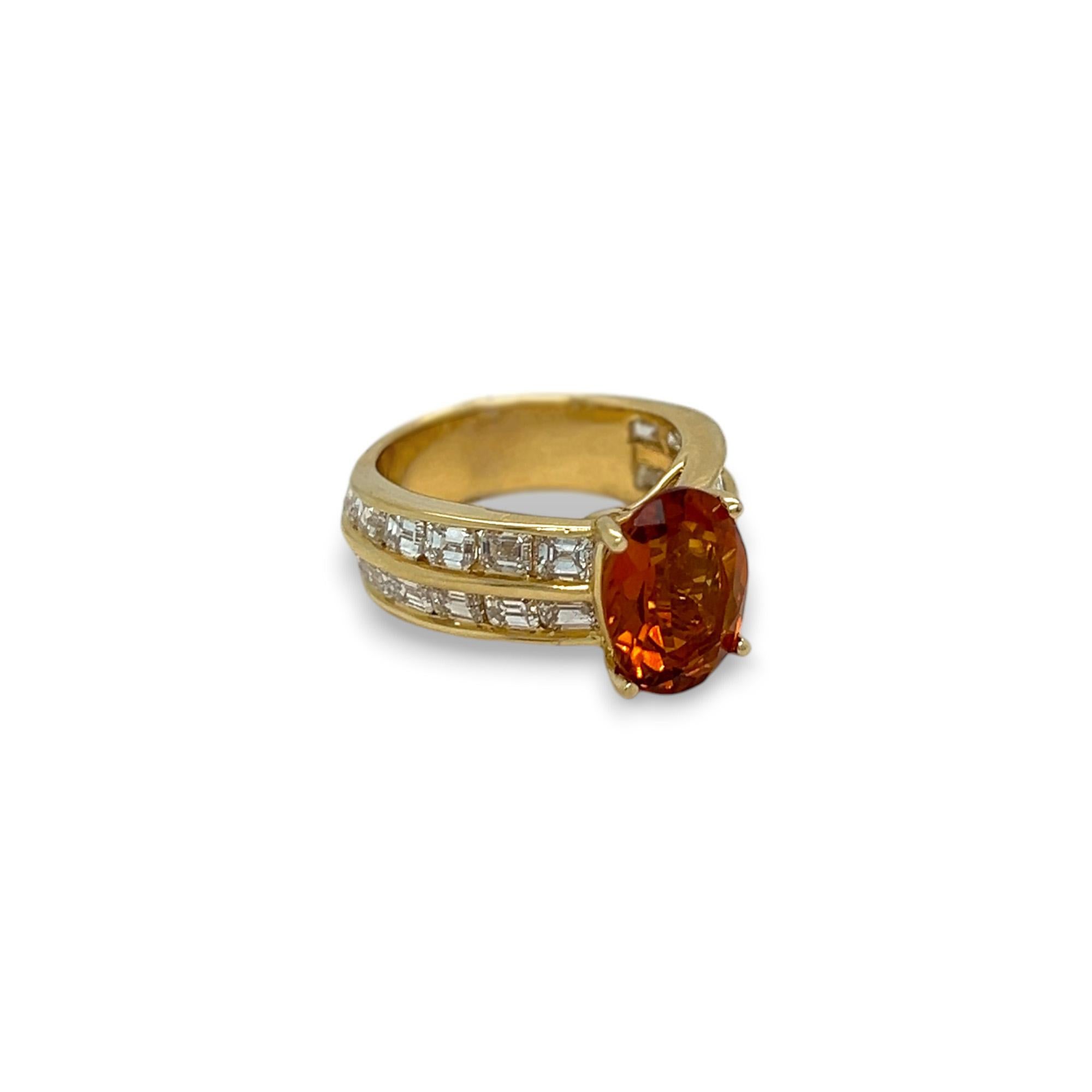 This gorgeous ring features a 2.98 carat citrine center stone set on a 14k yellow gold band. The band comprises of two rows of emerald cut diamonds of H/I color and VS clarity, which total 2.88 carat. Ring can be sized upon purchase.