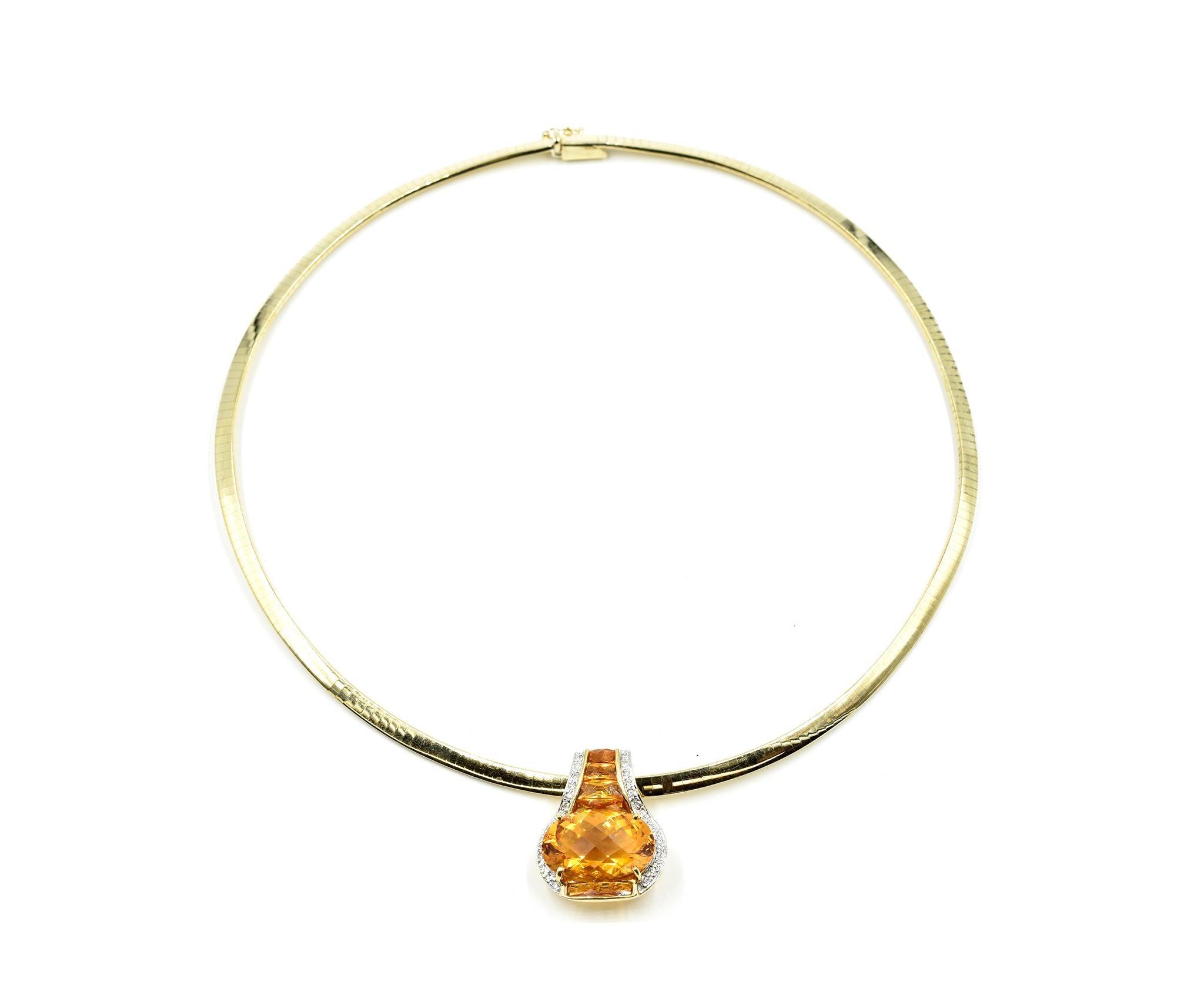 Designer: custom design
Material: 14k yellow gold
Gemstone: citrine
Diamonds: 28 round brilliant cut diamonds = 0.56 carat total weight
Color: H
Clarity: SI1
Dimensions: pendant measures 1-inch long and 1-inch wide, necklace measures 16-inches long