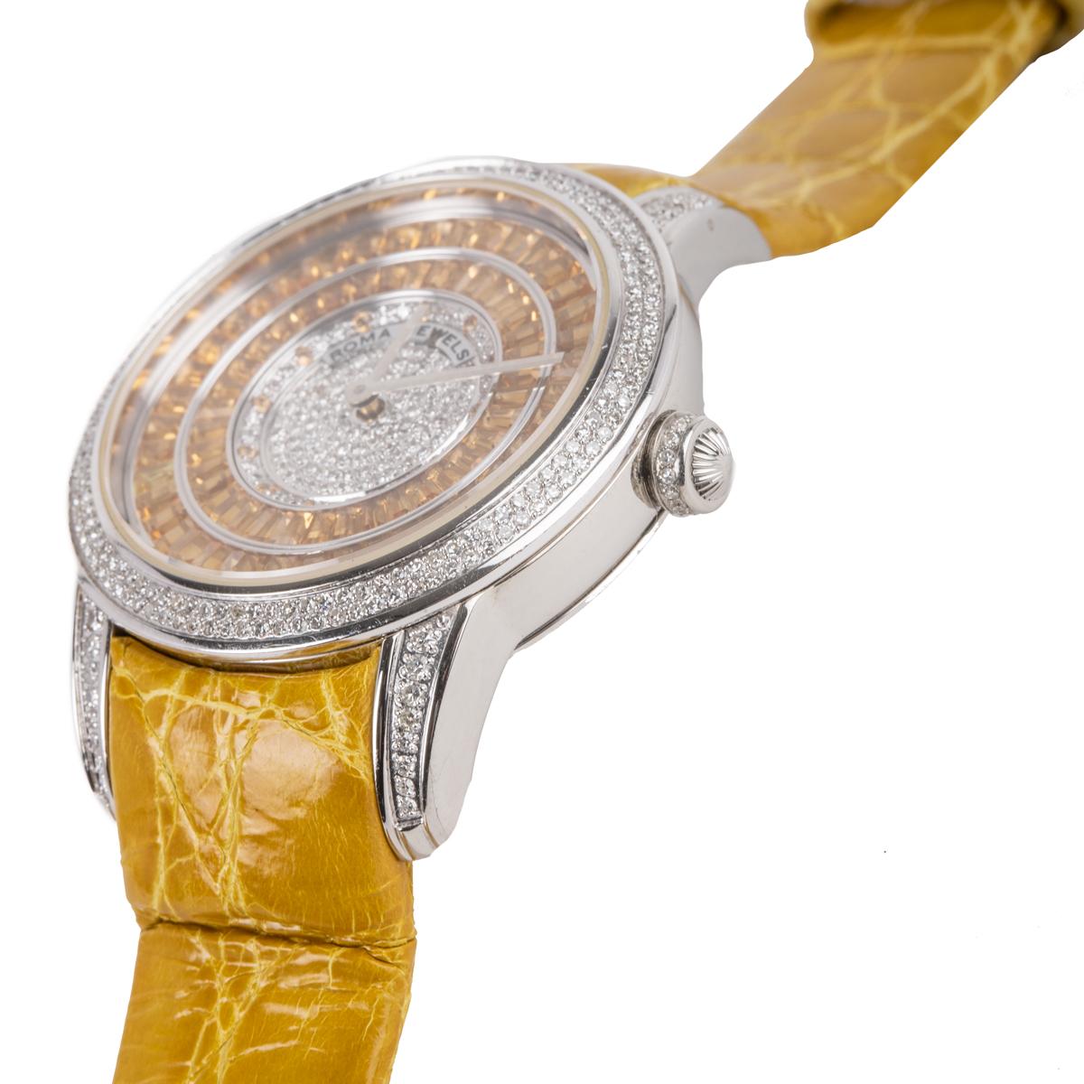 This watch features citrine stones in baguette-cut and round cut diamonds embedded on the face of the watch. This watch features automatic movement and is made with stainless steel and fine leather.