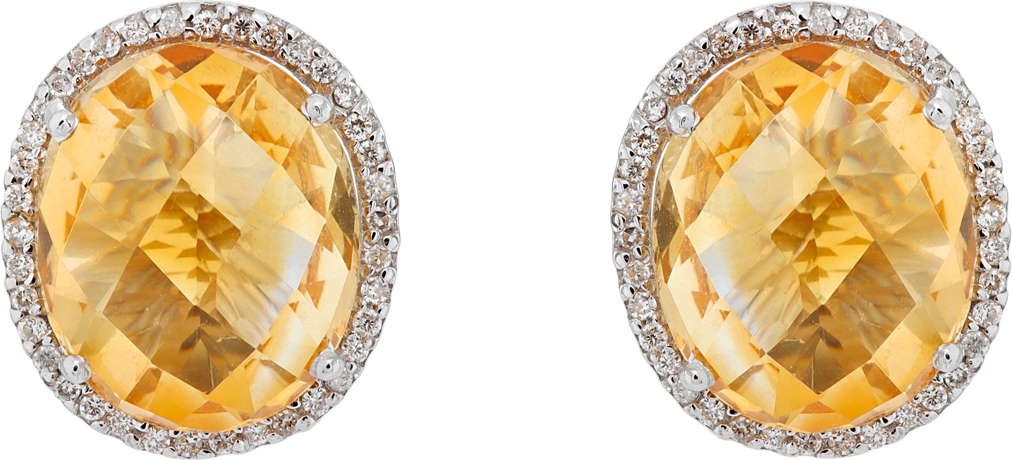 Faceted citrine and diamond ring and earrings jewelry set in 14k white gold. Approximately 0.50 carats in round accent diamonds. Ring size 6.5. Earrings measure 12mm x 15mm