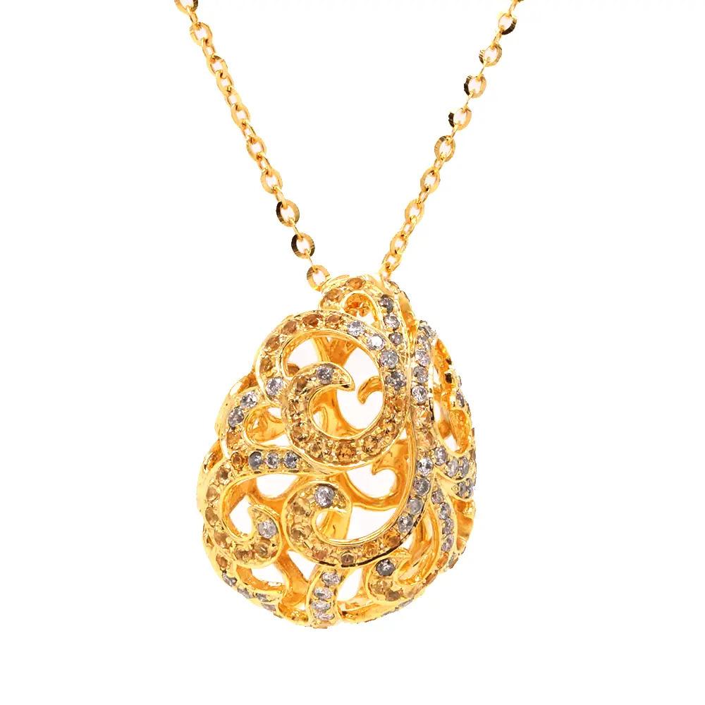 Whispering Filigree Openwork Egg Pendant Necklace, adorned with glistening citrines and sparkling diamonds, set in yellow gold-plated 18ct white gold. Suspended on a 16″ chain with a 2″ extender for adjustable length.

- Dimensions (HxW): 20 x