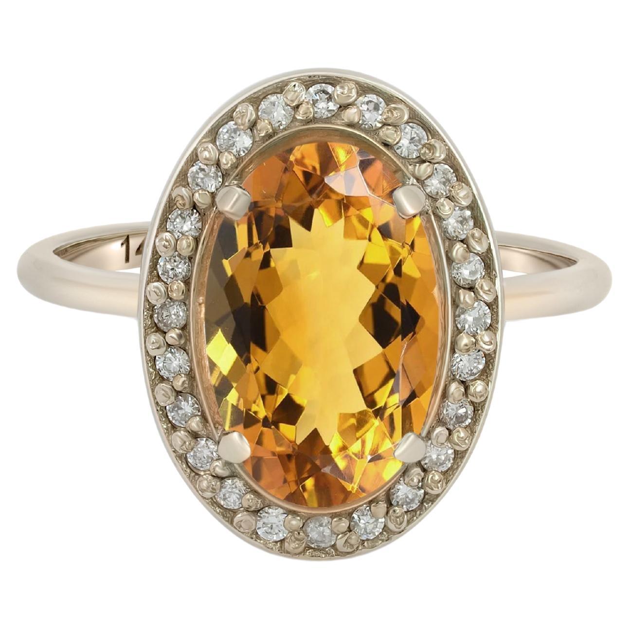 Ring mit Citrin und Diamanten aus 14 Karat Gold. 