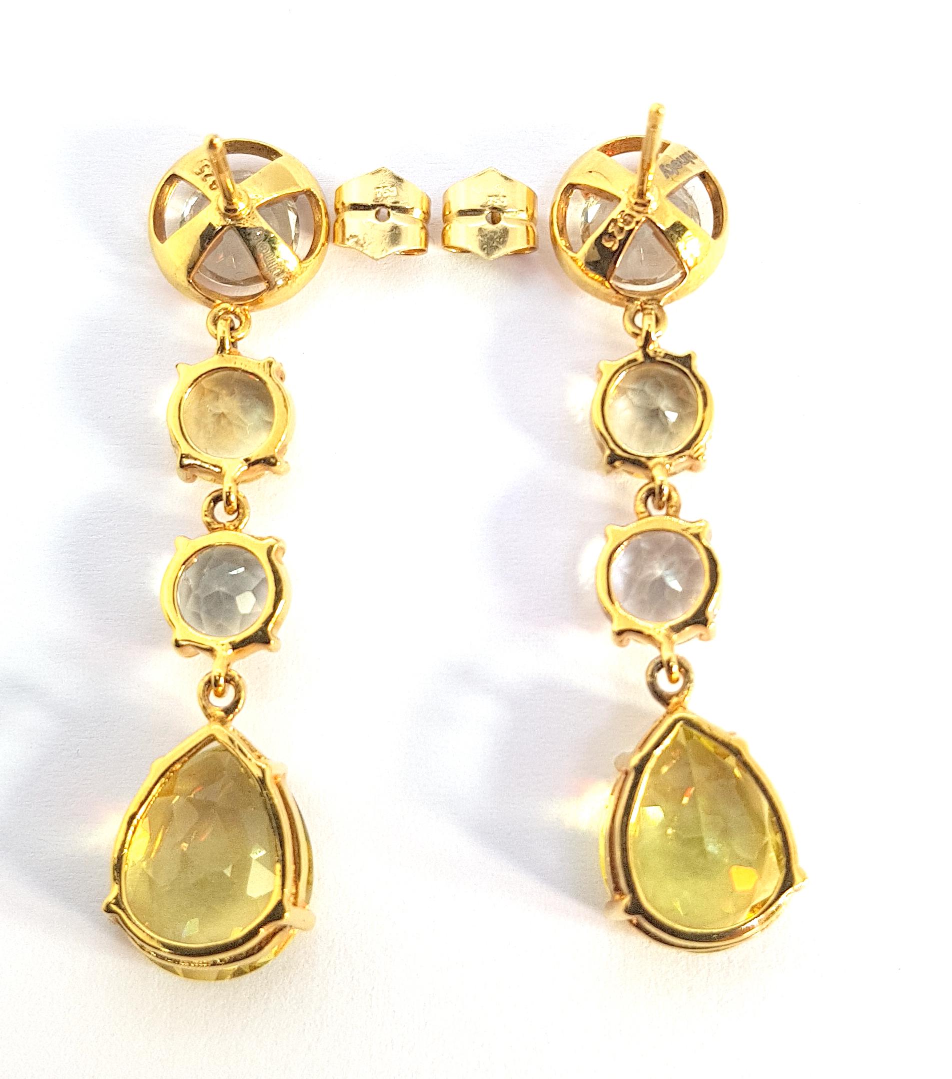 Gold plated in 18k yellow gold by 3 microns with silver base and 18kt gold closures
Stones are Lemon quartz citrines and green amethyst 
2 brilliant shape green amethyst 8x8mm (0.315x0.315) about 2ct look, each and 1 brilliant shape lemon quarts of