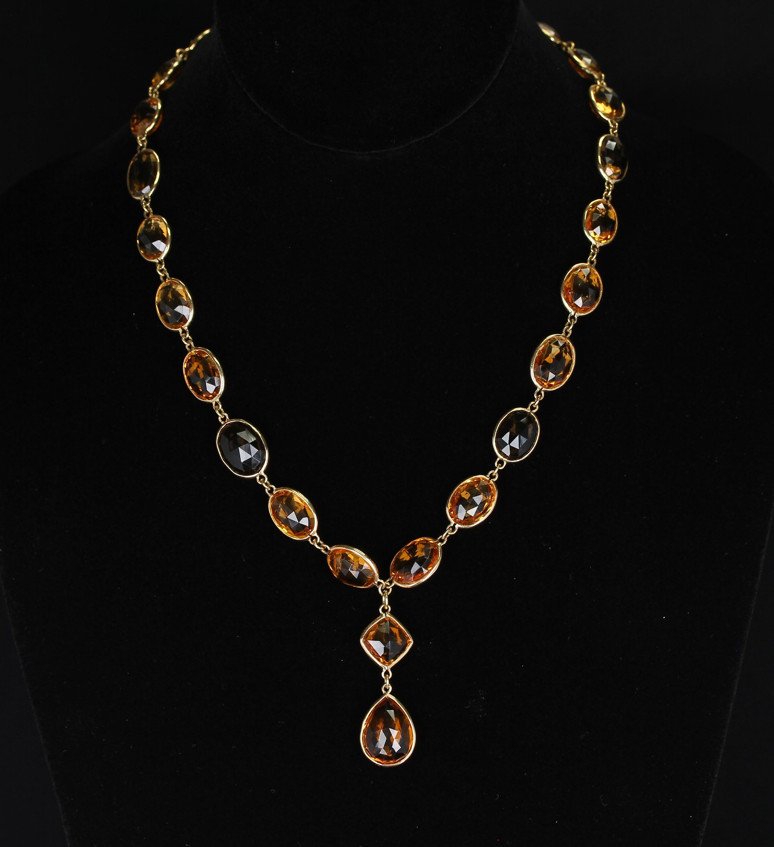 A fine 18K Yellow Gold Necklace with Double Cabochon Rose Cut Citrine and Smoky Quartz. Length: 18
