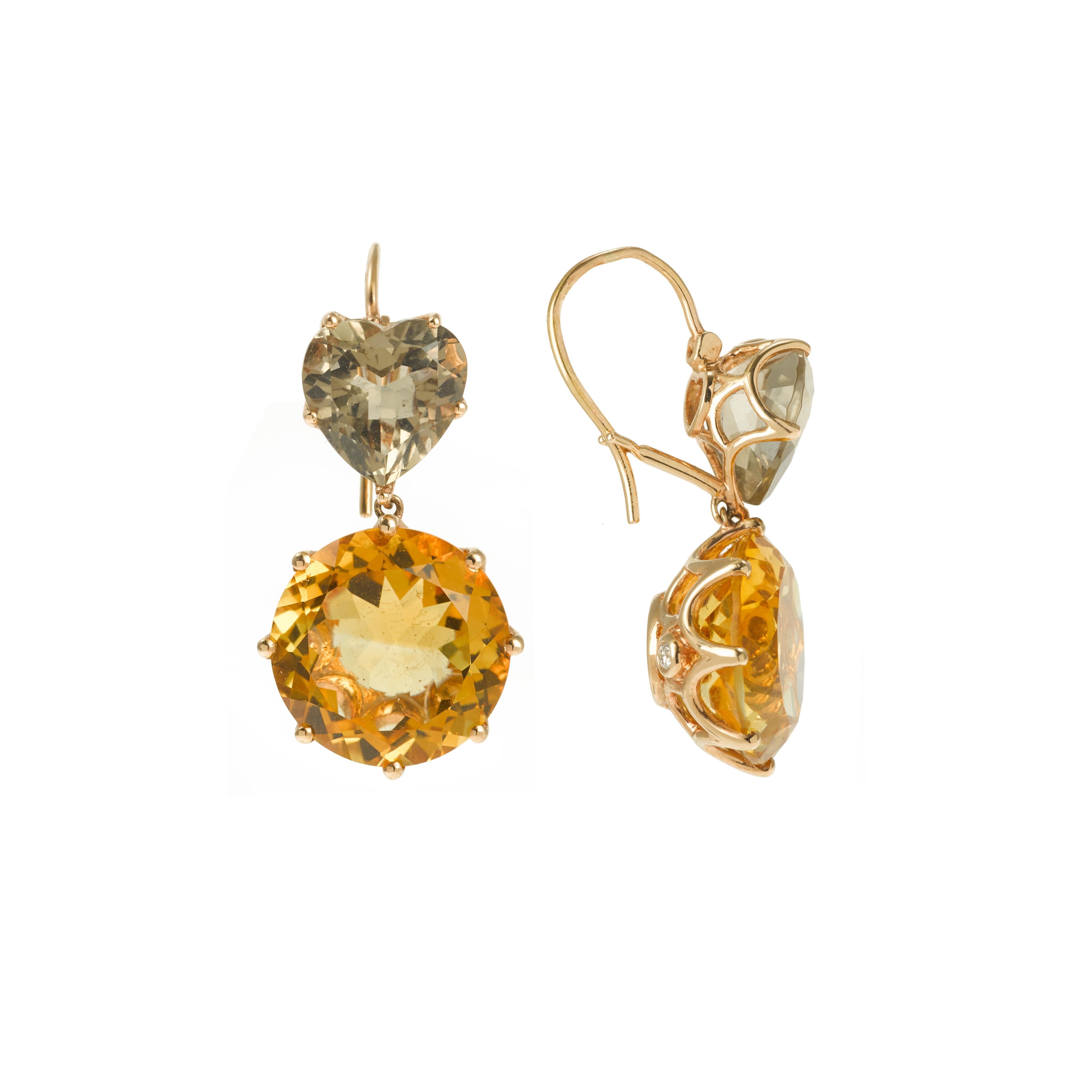 Lovely pair of earrings made of heart shaped smoky quartz  and a round citrine.
2 diamonds behind each earring !

18 carat yellow gold  750 / 1000th, eagle's Head stamp.

Smoky Quartz dimensions: 0.9 X 10 mm
Citrine diameter: 13.5mm

Height: 3