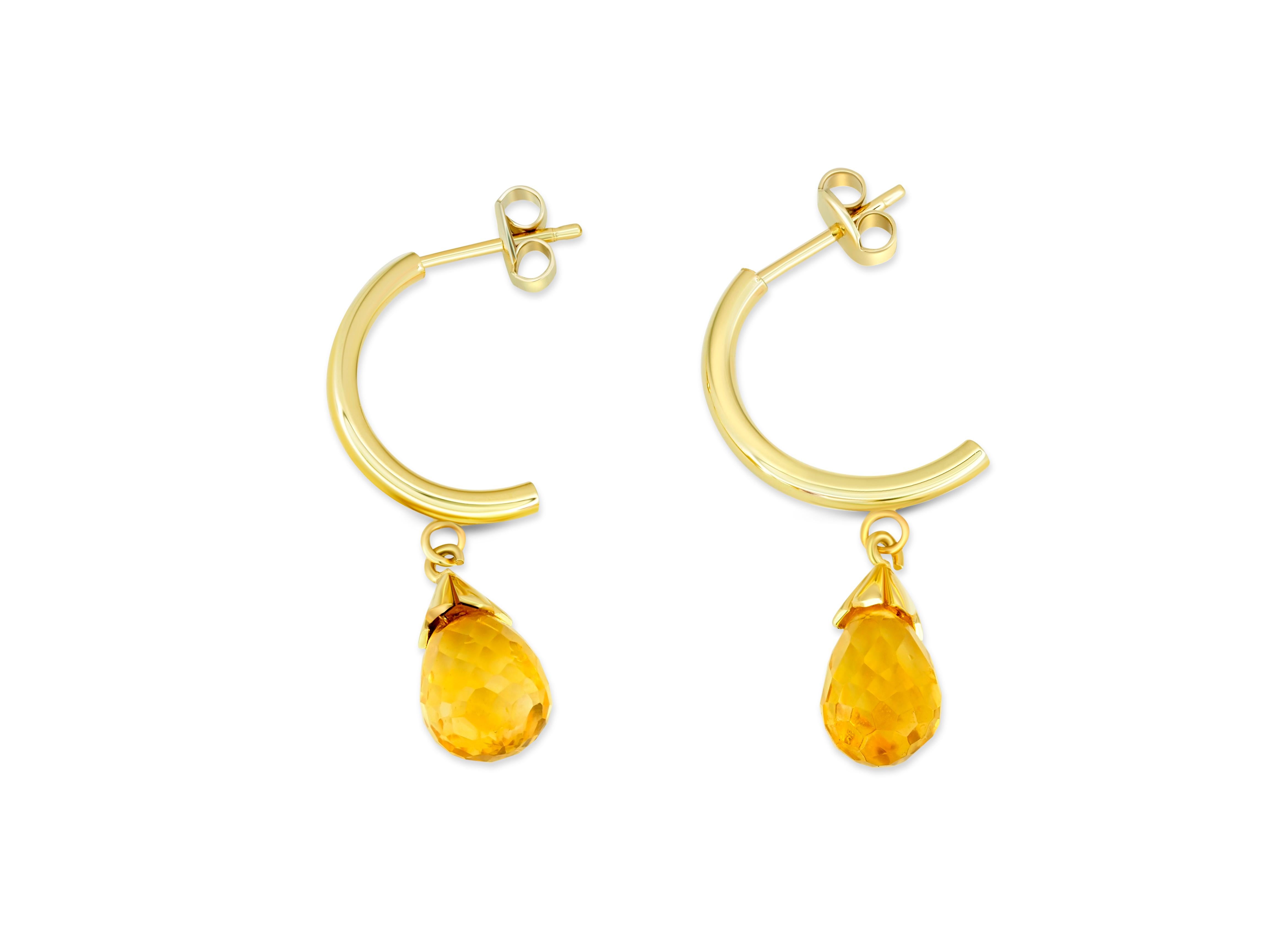 Citrine Briolette Drop Hoop Post Earrings in Yellow 14k Gold. 
Citrine huggy hoop earrings.Citrine Briolette Drop Hoop Earrings in 14k Gold.

Total weight: 2.4 g. 
Gold - 14k gold
Size: 23 mm - without briolette. 32 mm total with briollette.