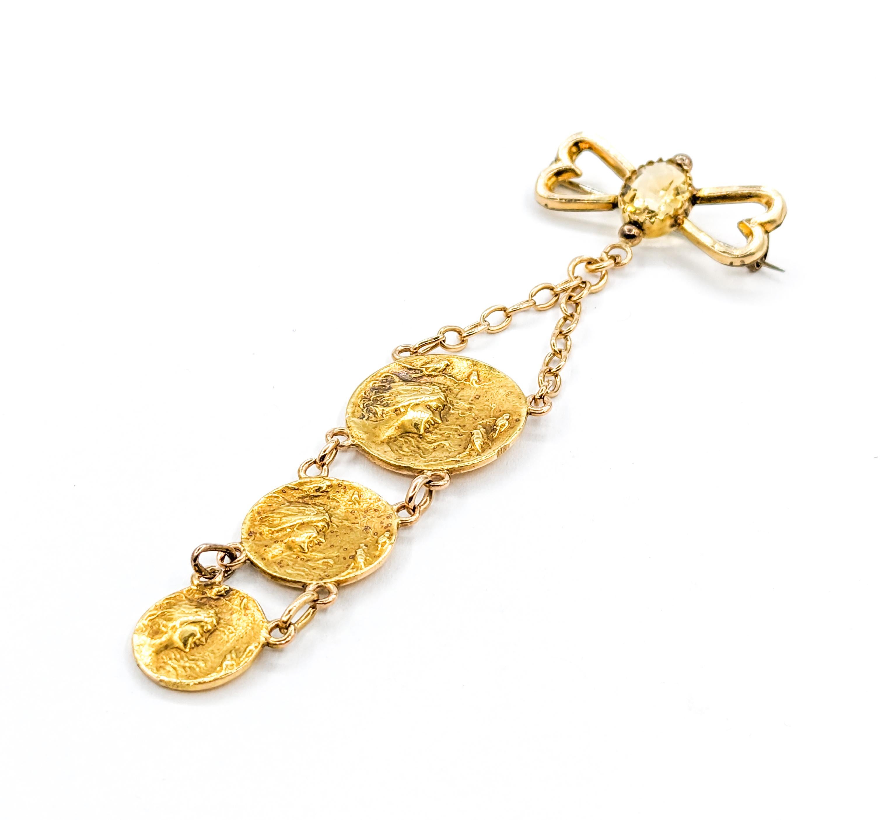 Citrine Brooch Art Nouveau Lady and birds In Yellow Gold

Introducing an elegant Art Nouveau Lady and Birds Brooch, meticulously crafted in 18kt & 10kt Yellow Gold. This stunning piece features a yellow Citrine gemstone with a golden hue. The Brooch