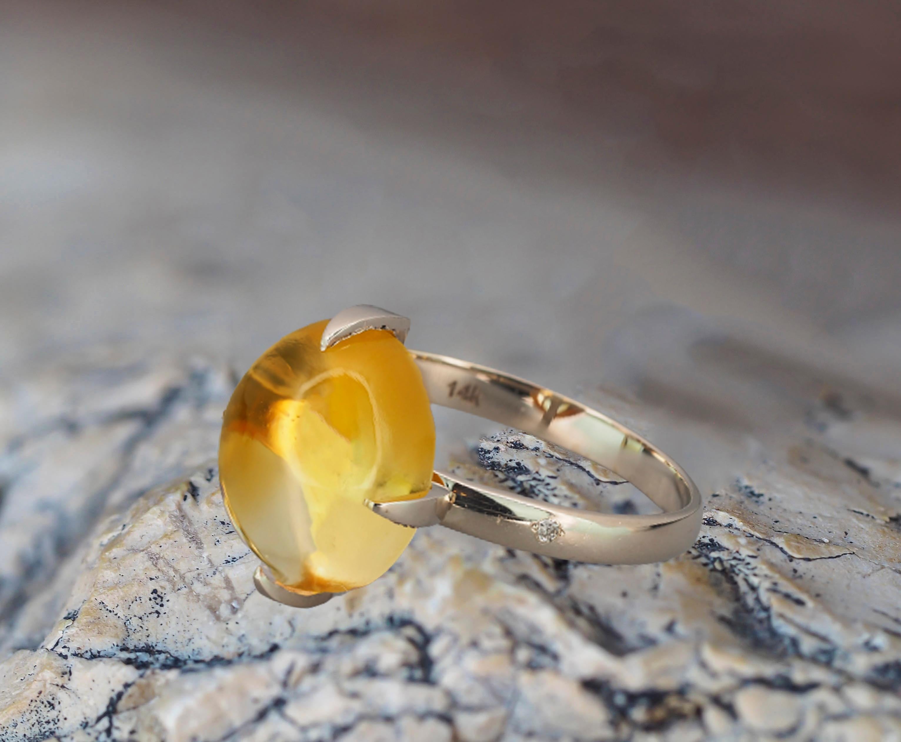 Citrine cabochon 14k gold ring. 
Citrine solitaire ring. Yellow citrine ring. November birthstone ring. Vintage citrine ring. Boho style ring.

Metal: 14k gold
Weight: 2.4 g. depends from size.

Set with citrine.
4.9ct. oval cabochon cut
Colour: