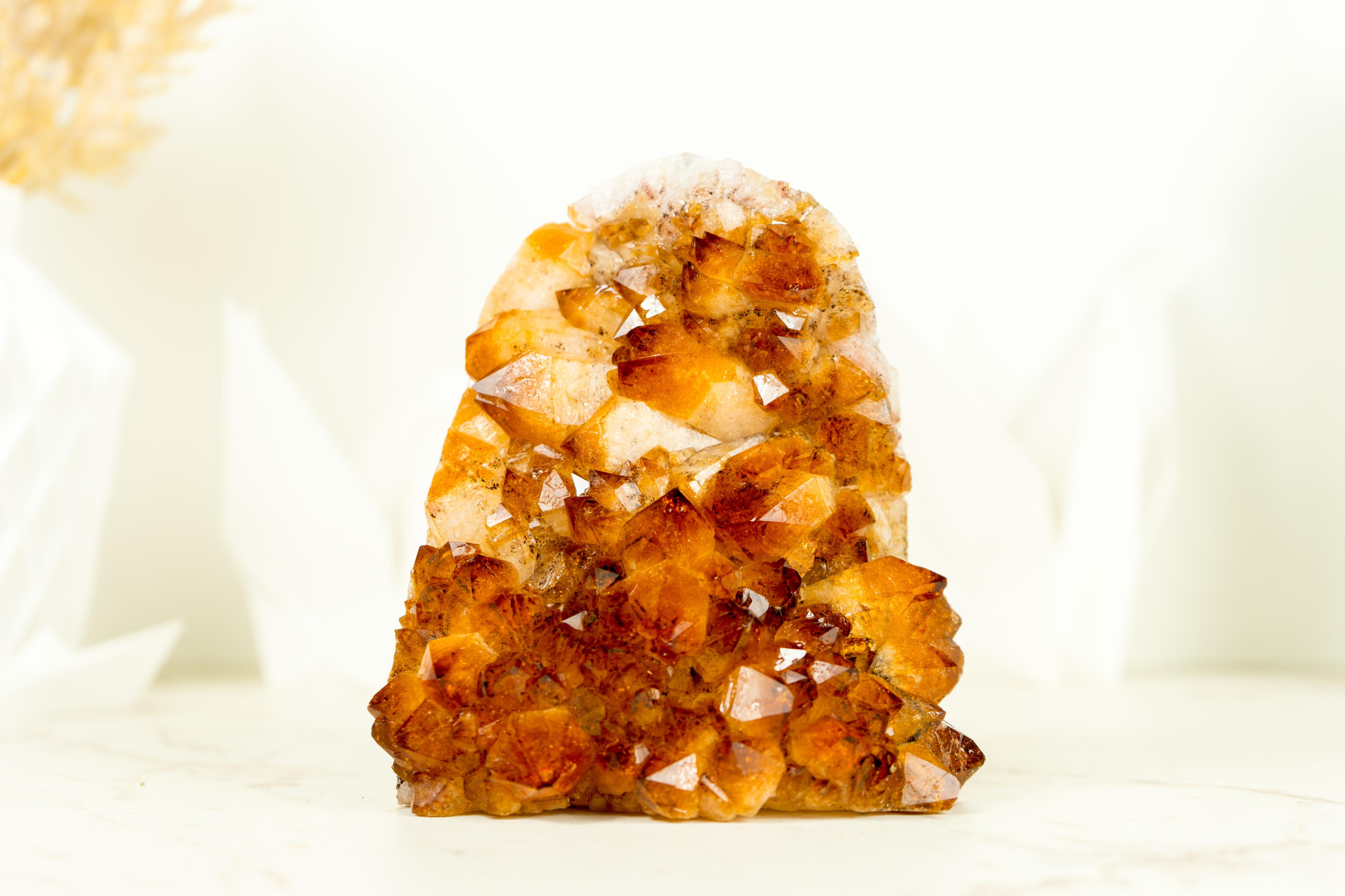 A Golden Orange Citrine Cluster considered to be world-class because of its color tones, gorgeous aesthetics, and rare characteristics, this Citrine Cluster will surely bring loads of energetic properties to your office table, home decor, or crystal