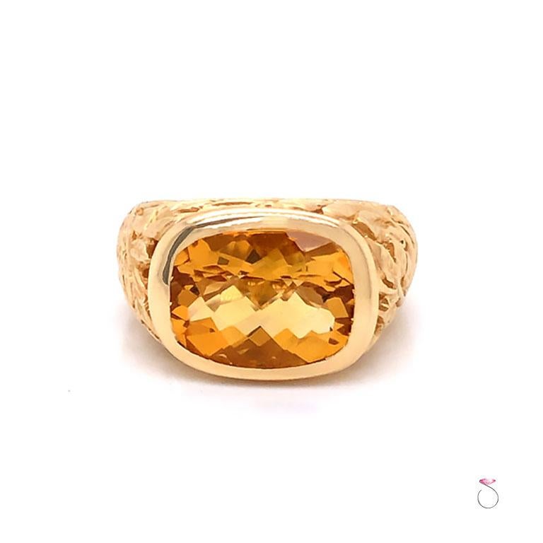 Citrine cushion cut ring in 14k yellow gold. This unique ring features a cushion shape golden yellow Citrine center gemstone with checker faceting. The Citrine measures approximately 12.9 mm x 9.8 mm x 7.5 mm with an estimated weight of 5.50 carats.
