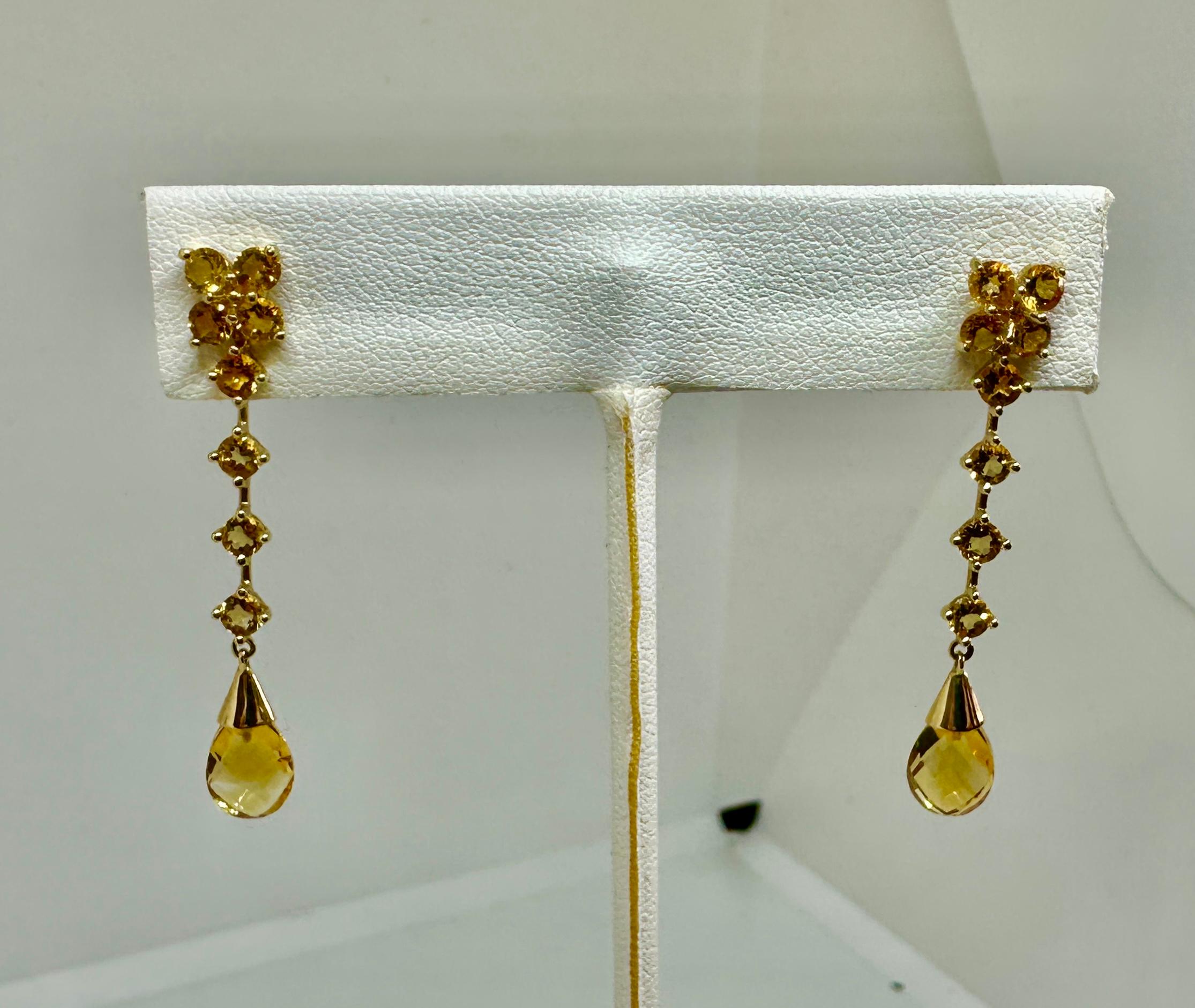 INDULGE IN A STUNNING PAIR OF FACETED CITRINE DAY NIGHT DROP DANGLE PENDANT EARRINGS OF 1 3/4 INCHES IN LENGTH IN 14 KARAT YELLOW GOLD.  The earrings are Day/Night earrings meaning the top stud portions can either be worn alone or with the long