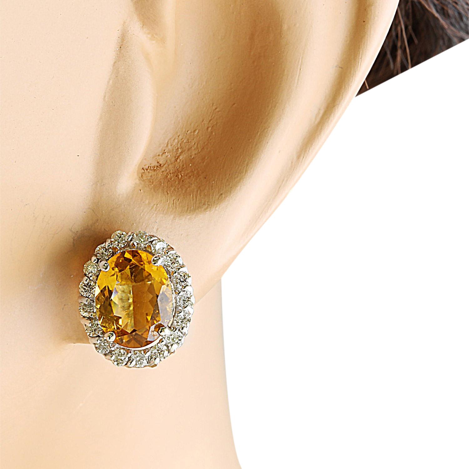 3.90 Carat Natural Citrine 14 Karat Solid White Gold Diamond Earrings
Stamped: 14K 
Total Earrings Weight: 2.8 Grams 
Citrine Weight: 3.20 Carat (9.00x7.00 Millimeters)  
Quantity: 2
Diamond Weight: 0.70 Carat (F-G Color, VS2-SI1 Clarity)
Quantity: