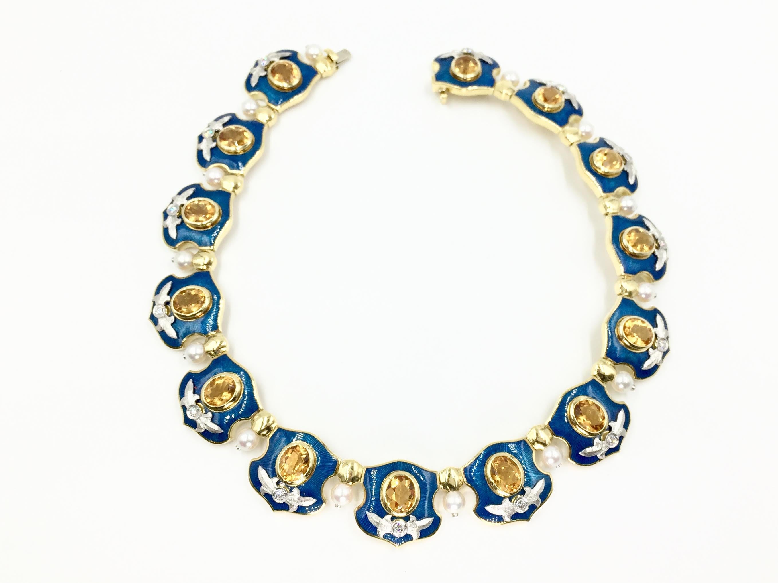 Made with incredible craftsmenship by American designer, Mitchell Peck. This colorful and substantial collar style necklace features 14 shield shaped links made of 18 karat yellow gold with hand painted bright turquoise blue colored enamel. A large