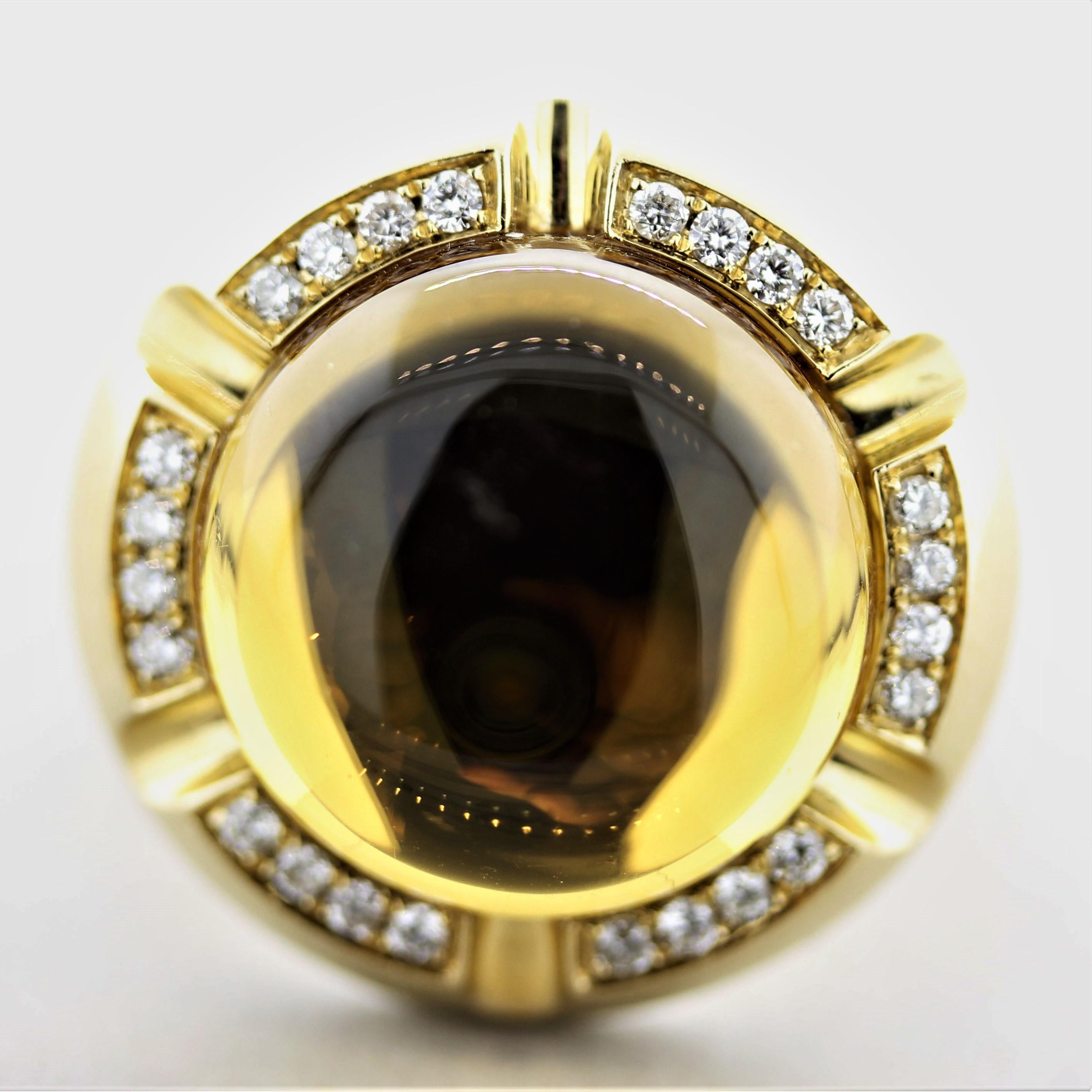 A fin and stylish gold ring featuring a domed cabochon citrine and bright white diamonds! The citrine weighs 16.67 carats and is free from any visible inclusions making the stone appear to be a glowing crystal ball! It is accented by 0.30 carats of