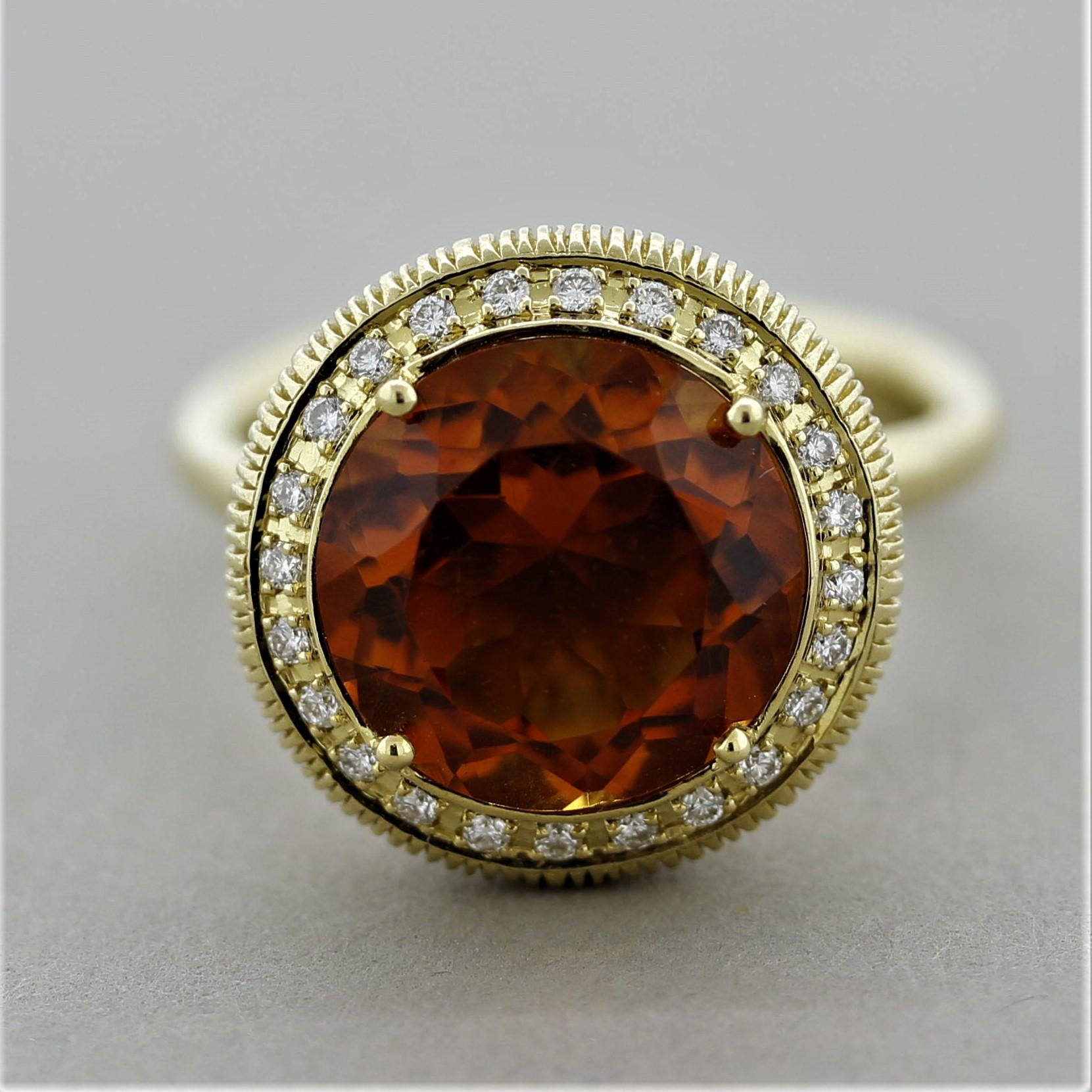 A sleek and stylish ring featuring a 6.00 carat citrine with an amazing vivid orange color. The crystal is completely clean allowing the gems natural brilliance to shine, as this is one of the finest citrines we have seen. It is accented by 0.18