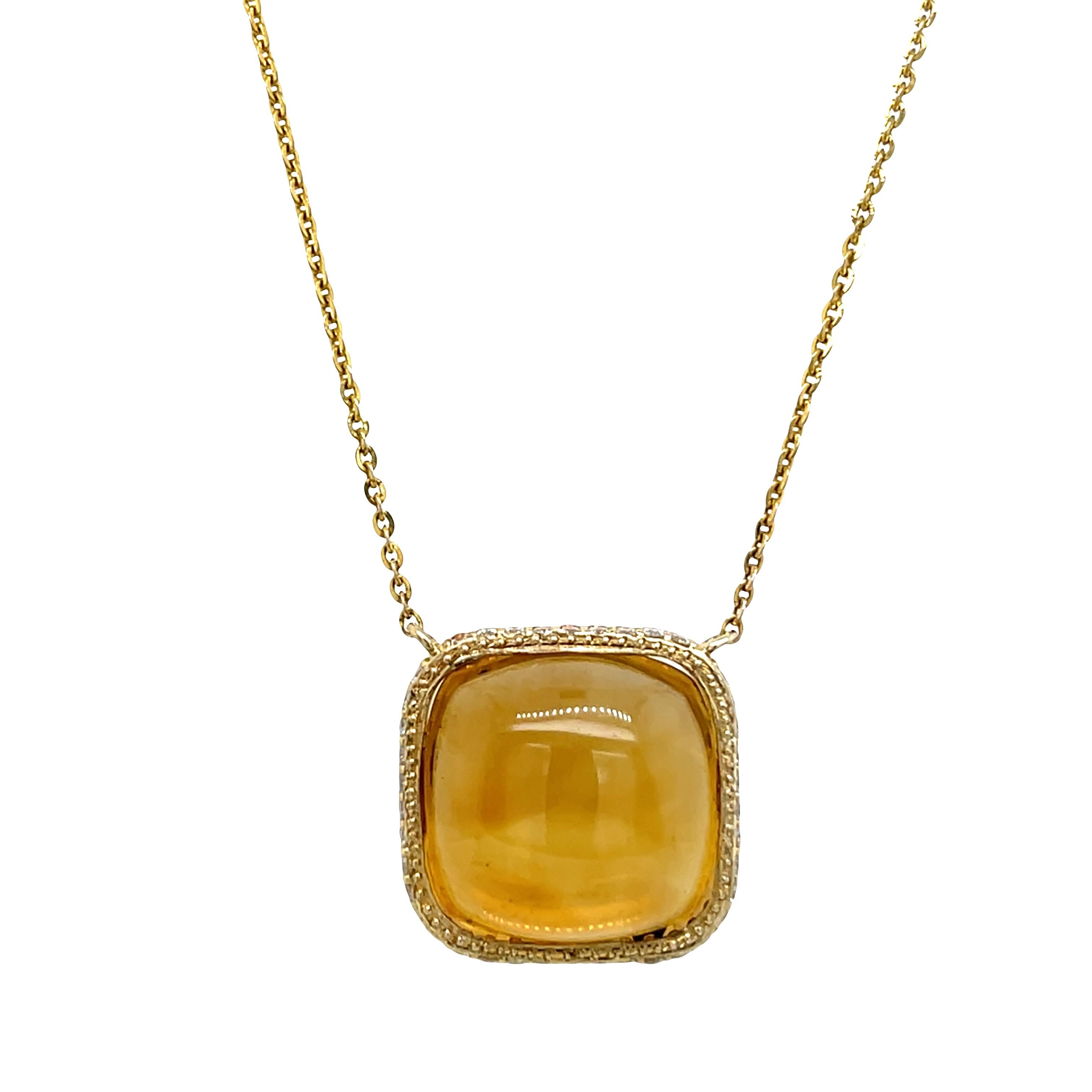 Rayonnant et plein de chaleur, ce pendentif en or jaune 18 ct présente une citrine vibrante au centre, entourée d'un étonnant halo caché de diamants et de citrines étincelants. Le design met en valeur la profondeur et l'éclat de la pierre précieuse