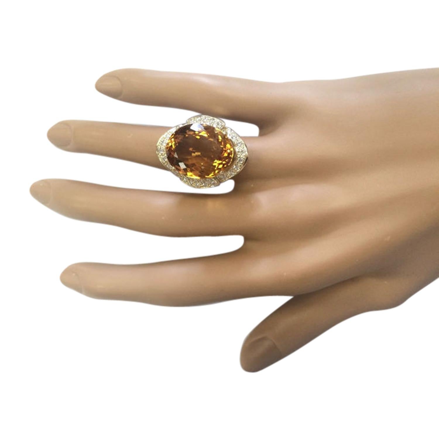 17.06 Carat Natural Citrine 14 Karat Solid Yellow Gold Diamond Ring
Stamped: 14K 
Total Ring Weight: 7 Grams 
Citrine Weight: 16.46 Carat (18.00x13.00 Millimeters) 
Diamond Weight: 0.60 Carat (F-G Color, VS2-SI1 Clarity )
Diamond Quantity: 34
Face