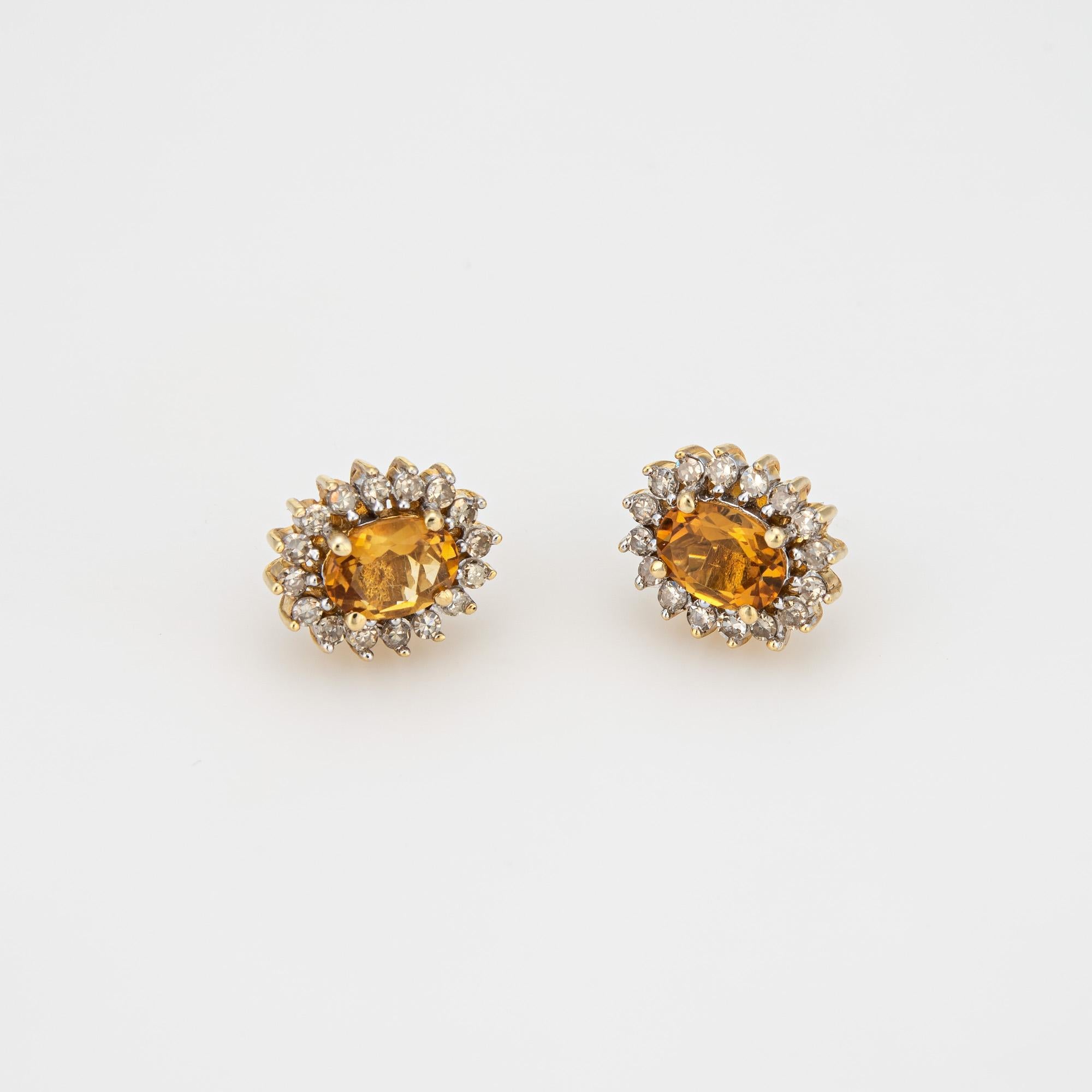 Finely detailed pair of citrine and diamond stud earrings crafted in 14k yellow gold. 

Oval faceted citrines measure 7mm x 5mm, accented with an estimated 0.25 carats of diamonds (estimated at I-J color and SI2-I2 clarity). 
The sweet earrings are