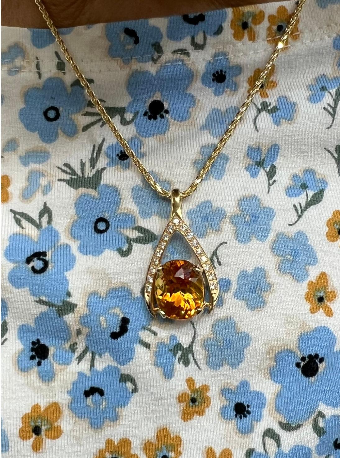 Citrine and Diamond Wishbone yellow gold pendant necklace, circa 1990s.

The Citrine and Diamond Wishbone Yellow Gold Pendant Necklace, dating back to the 1990s, exemplifies the intersection of artistry and craftsmanship that characterizes fine