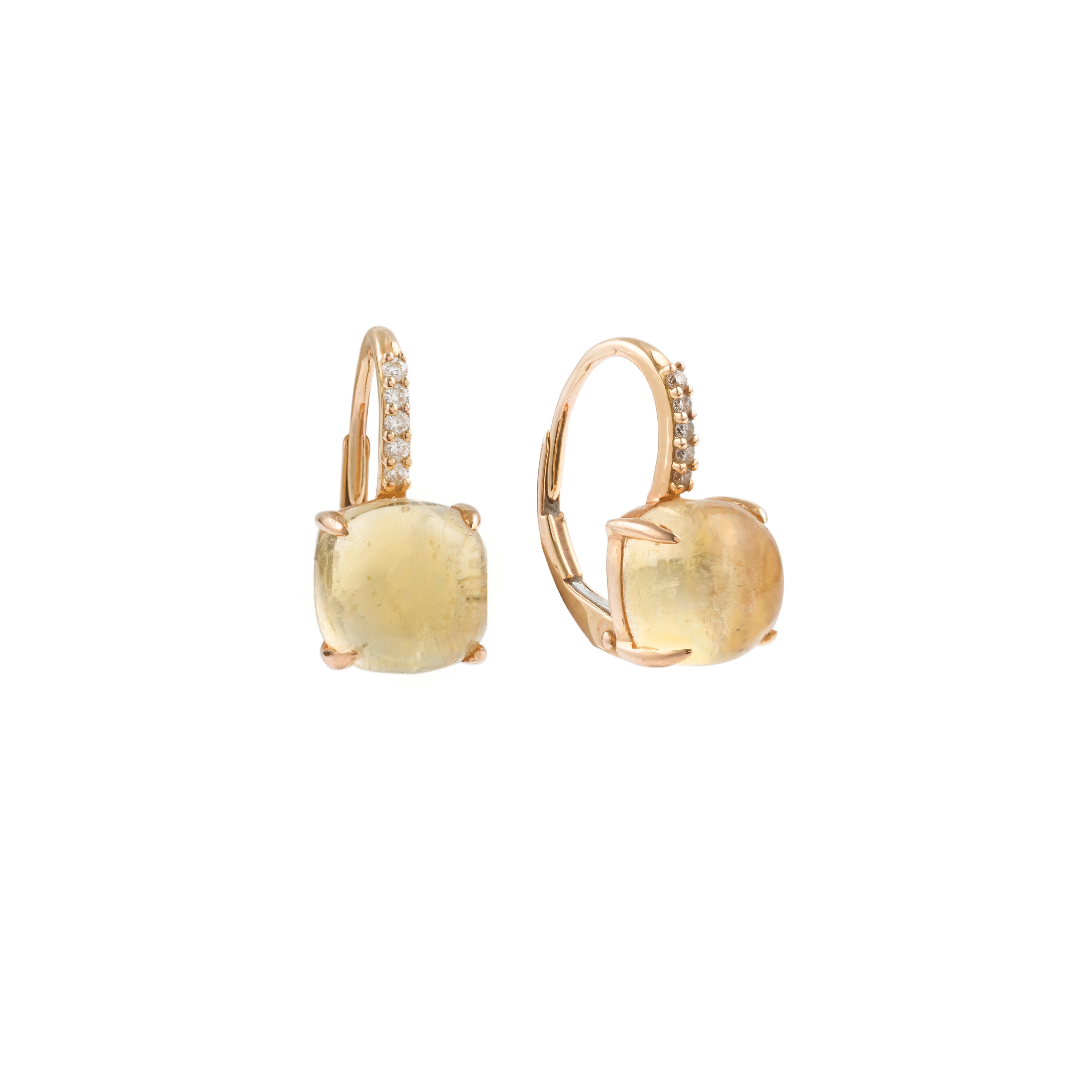 Very elegant and charming cushion shaped citrine and five diamonds 18K Yellow gold earrings.

18K gold 750 / 1000th

Total Height: 1.7 cm