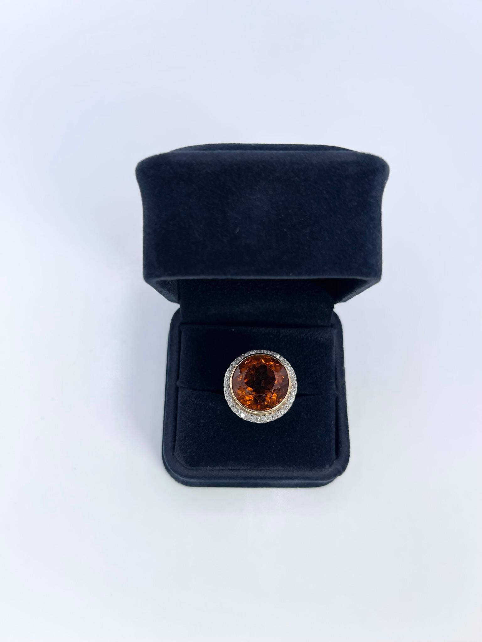 Rare imperial citrine diamond ring, the citrine is AAAA quality with cognac orange hues that are a rare find, the ring is a Victorian style made in 14KT yellow gold. 

GRAM WEIGHT: 11.54gr
GOLD: 14KT yellow gold
NATURAL CITRINE
Count: 1 (15mm)
Cut: