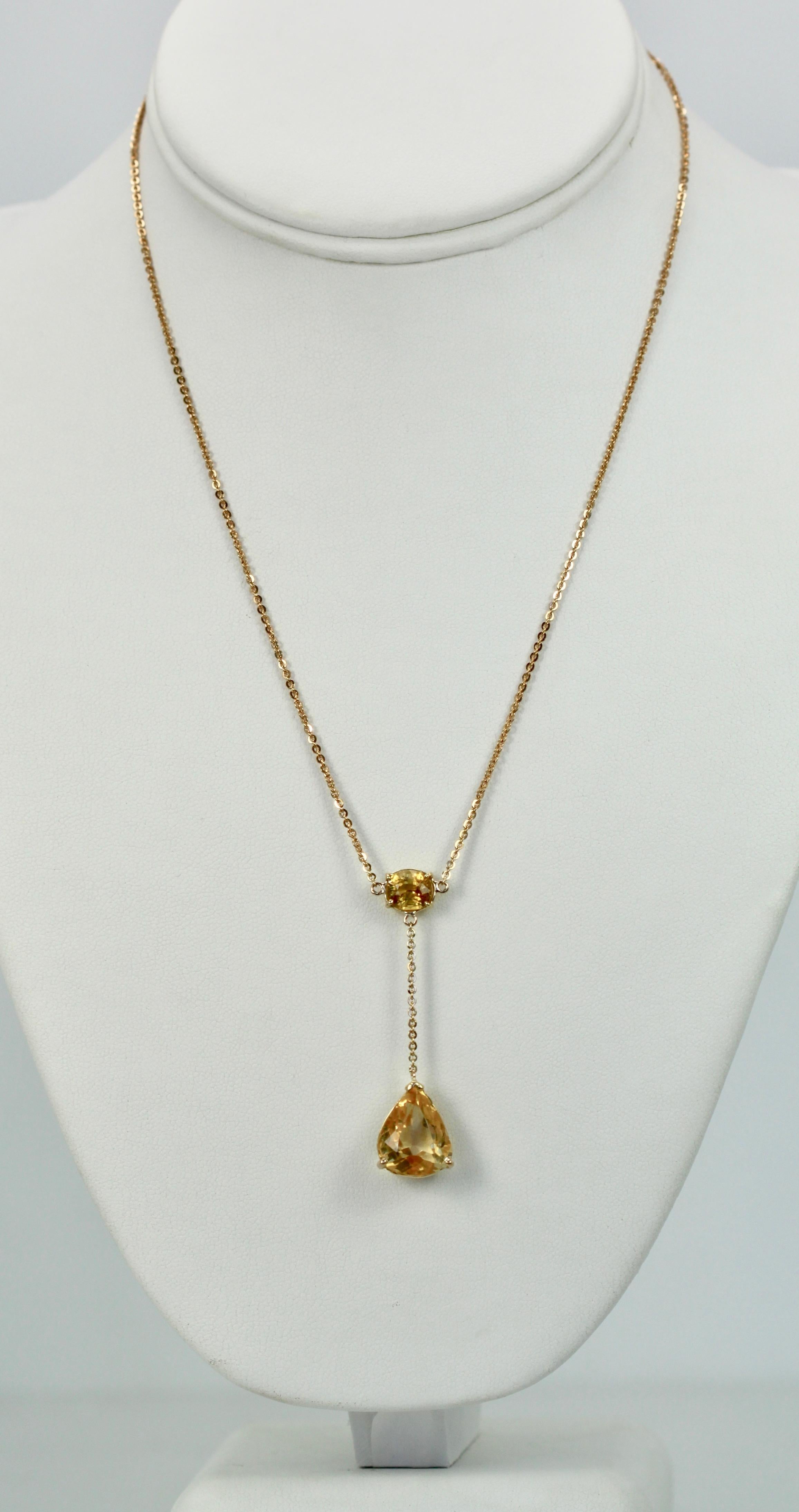 Simple but lovely this Citrine Drop Necklace is set in 18K Yellow Gold. This necklace has two Citrines, one oval citrine of 1.25 Carats and a pear shaped Citrine of approximately 6 Carats.  All in all the necklace boosts 7.25 carats of beautiful