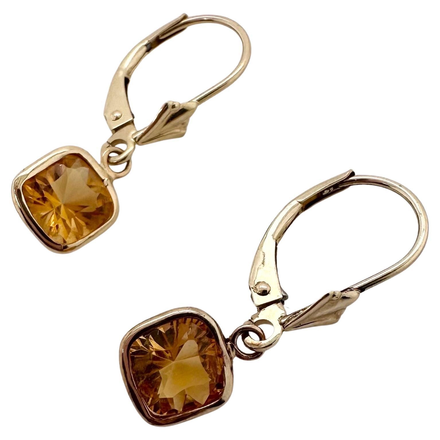 Rare cushion citrines cut with optix cut, its a cut that makes more facets and thus sparkles more, earringds are made in 14Kt gold.

Certificate of authenticity comes with purchase

ABOUT US
We are a family-owned business. Our studio in located in
